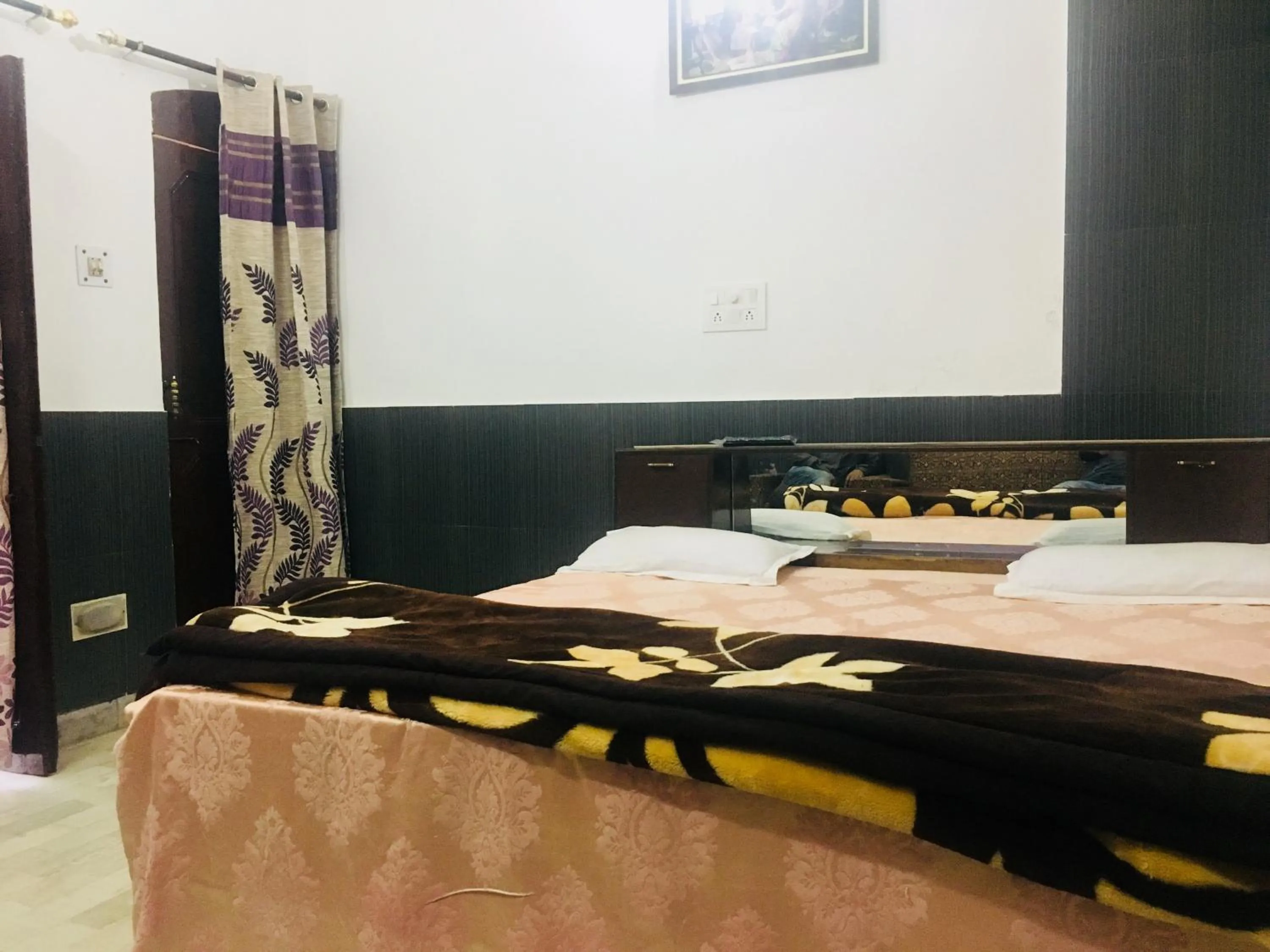 Bed in Hotel Heritage Sanyam