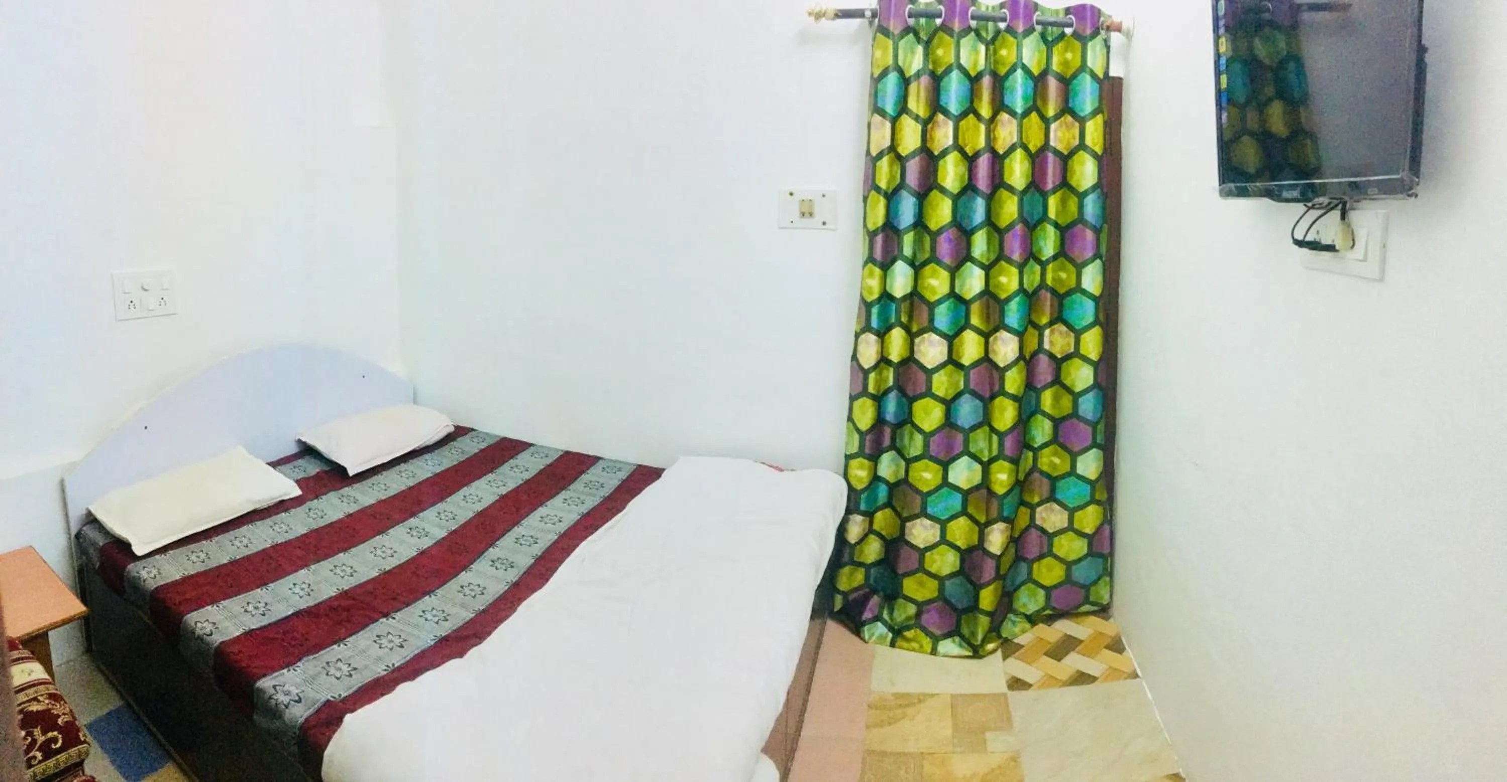 Bed in Hotel Heritage Sanyam