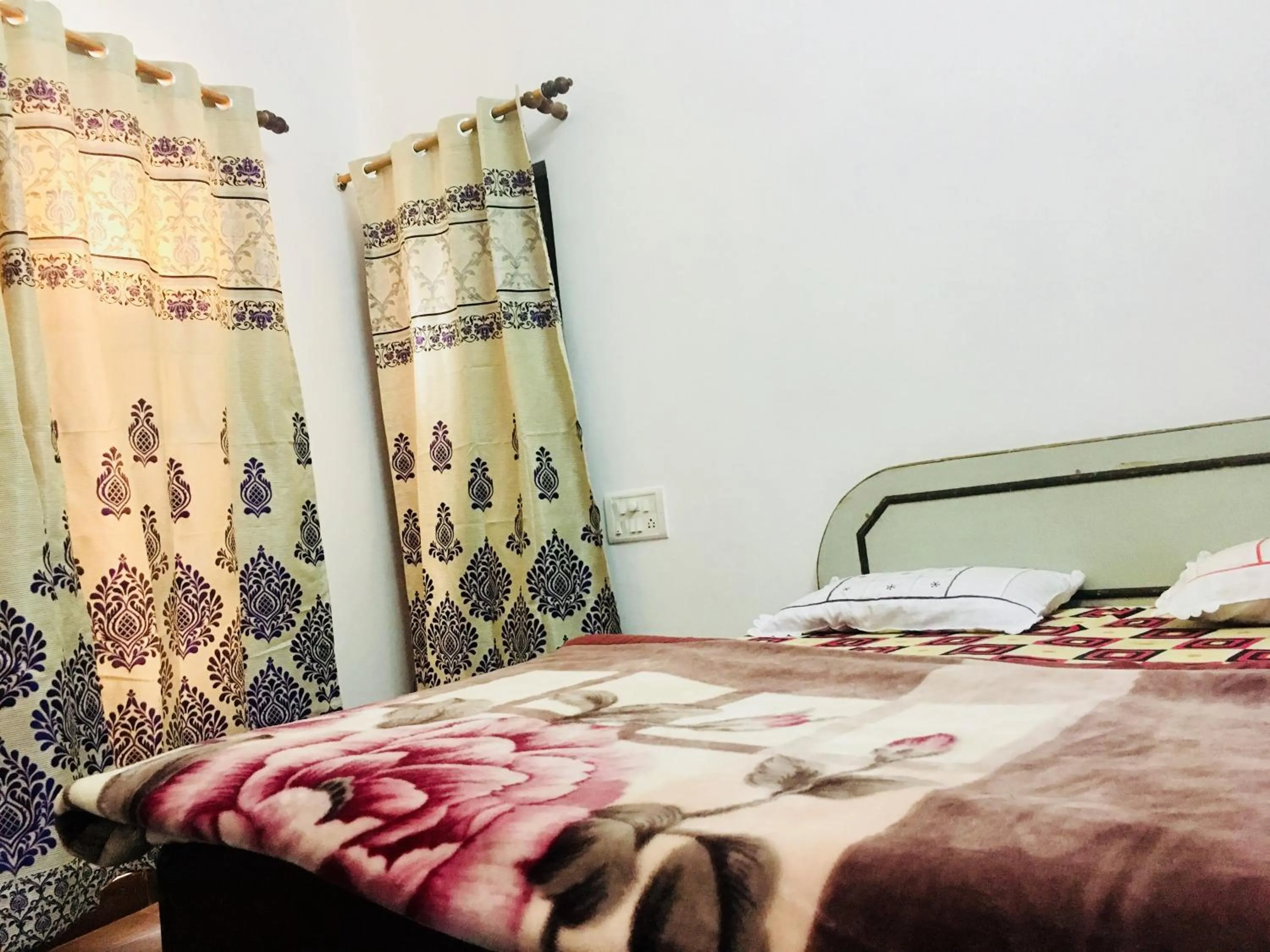 Bed in Hotel Heritage Sanyam