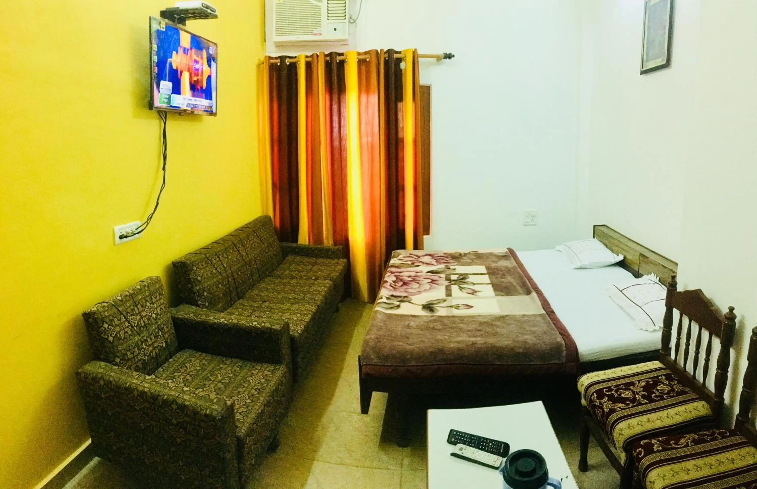 Bed in Hotel Heritage Sanyam