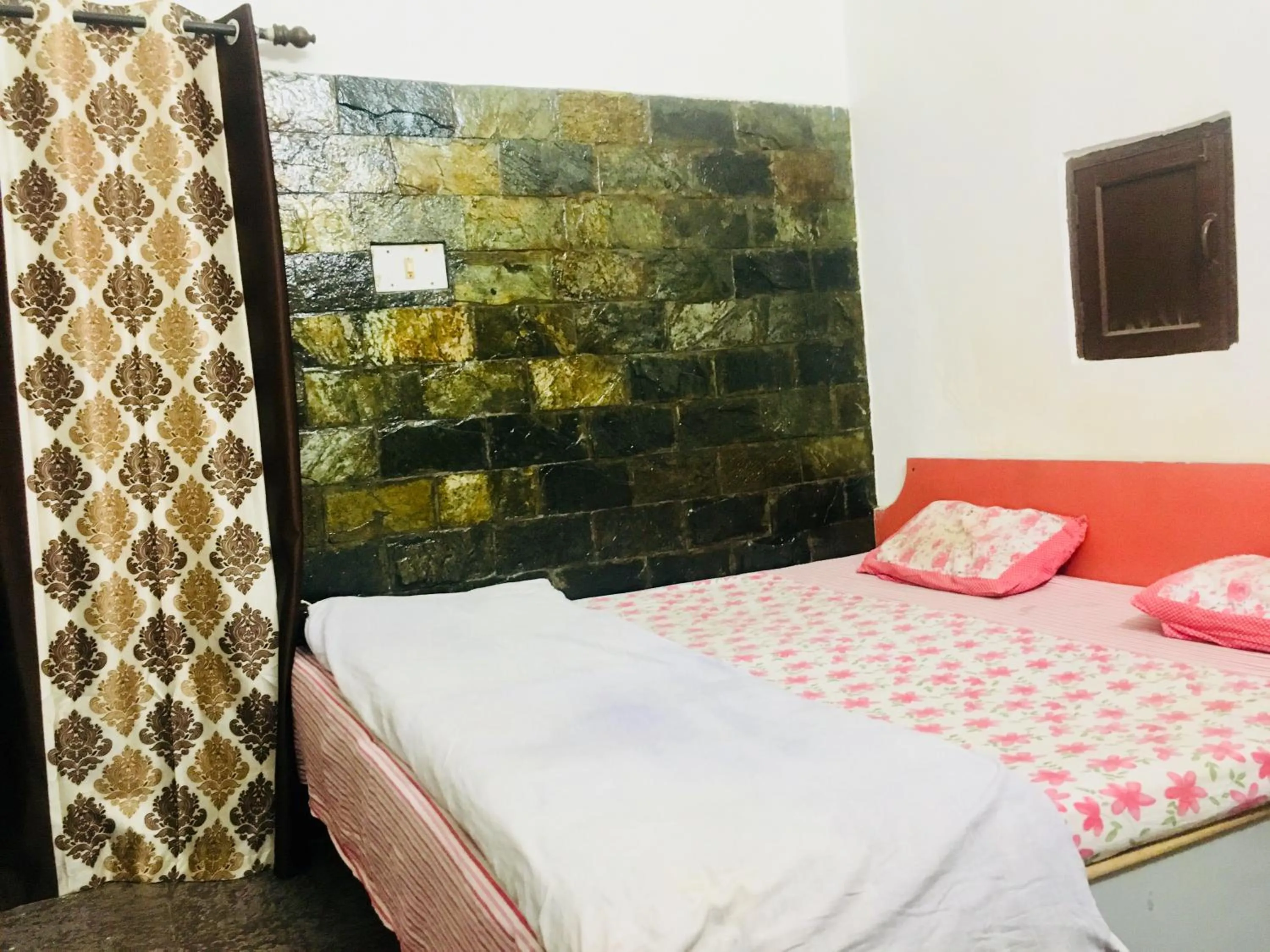 Bed in Hotel Heritage Sanyam