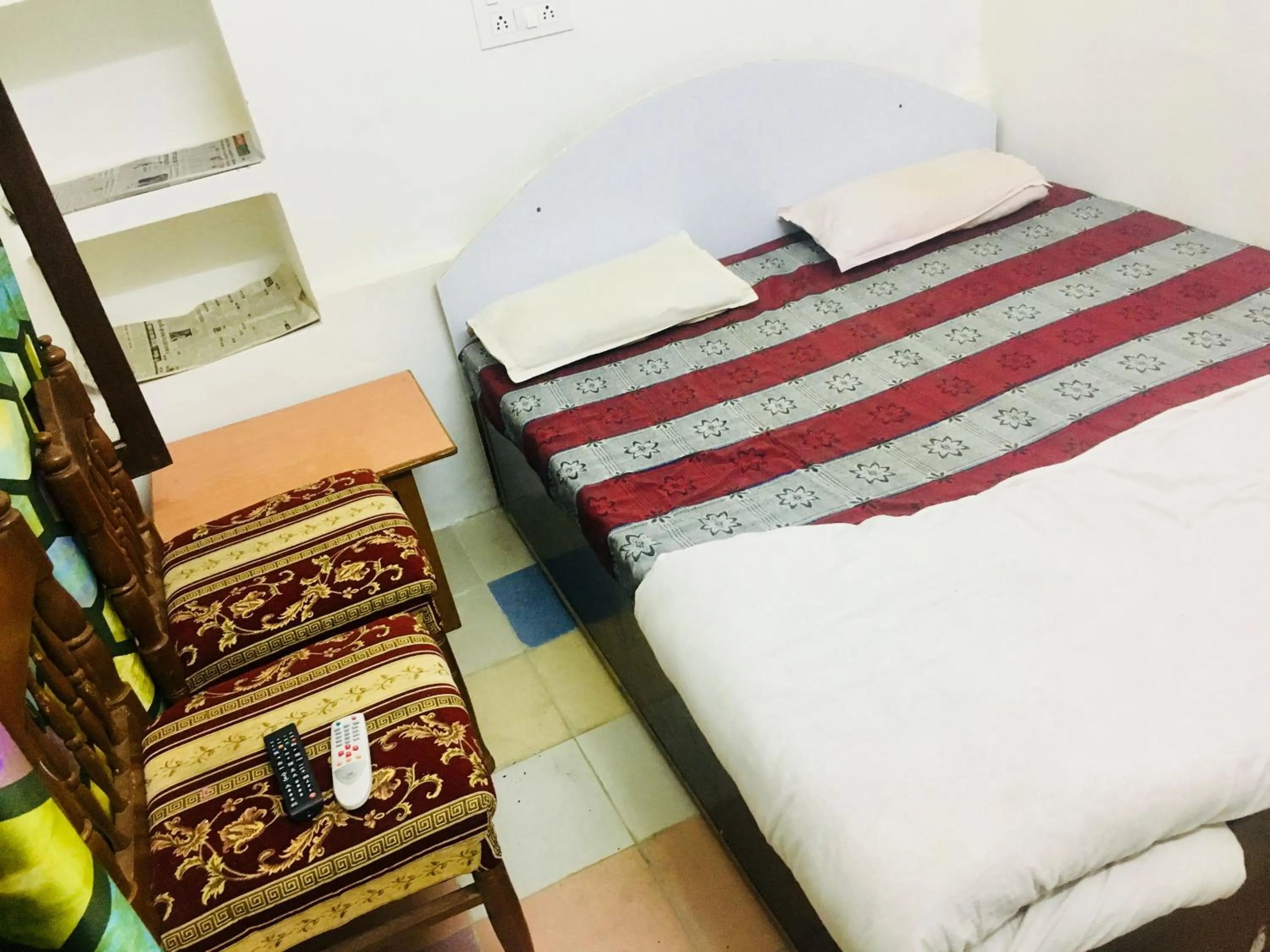 Bed in Hotel Heritage Sanyam