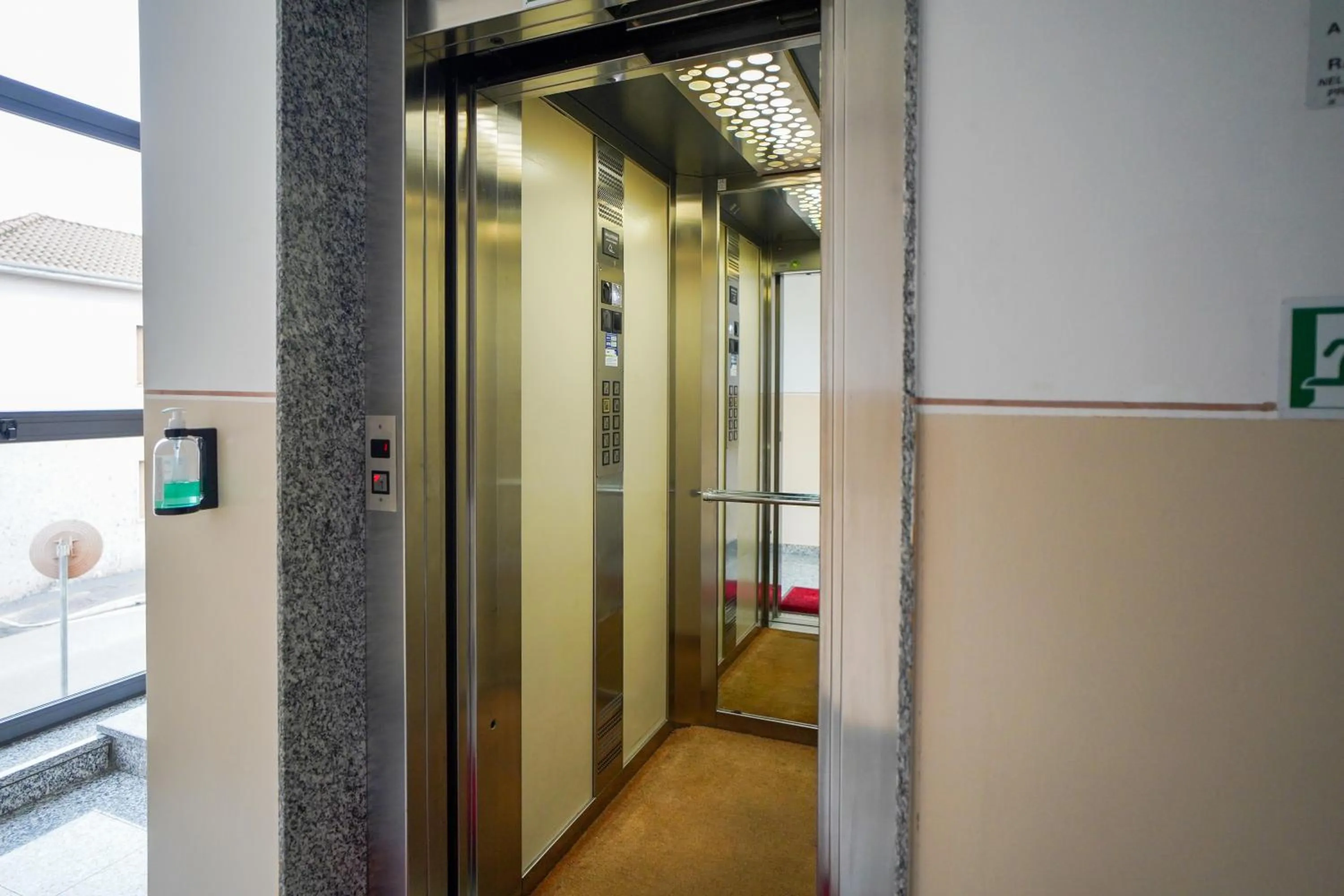 elevator in Bnbook Expo Residence Rho