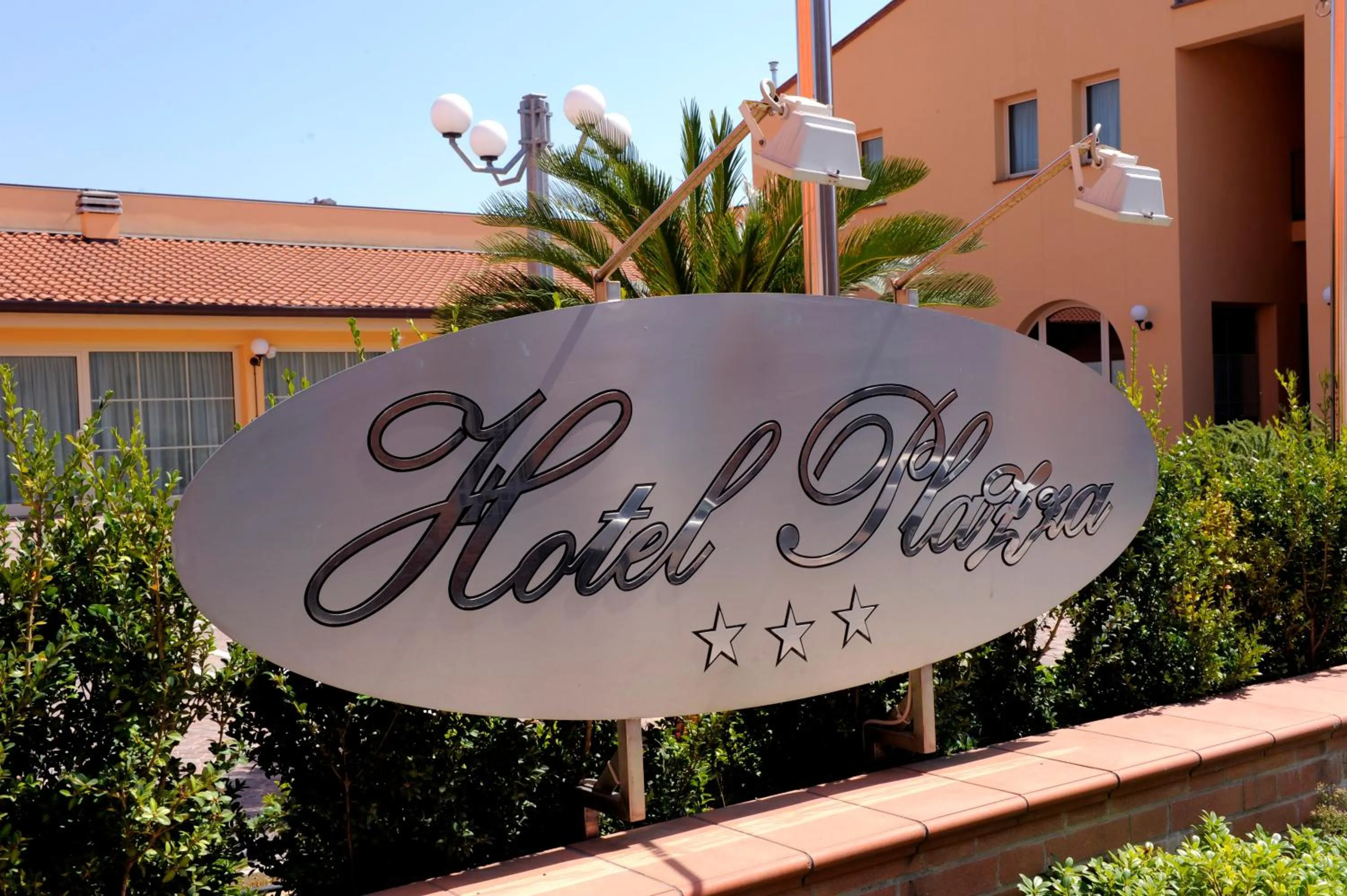 Property logo or sign in Hotel Plazza
