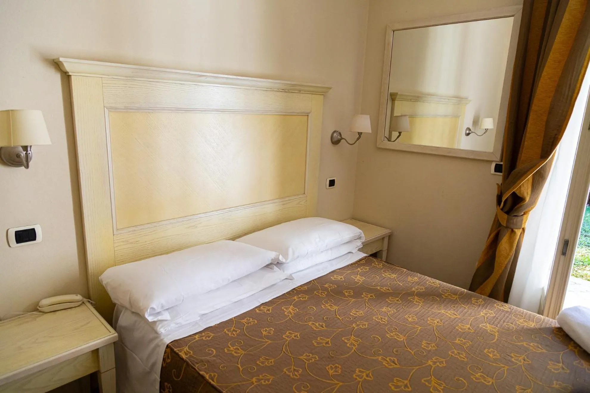 Bed in Hotel Villa Tiziana