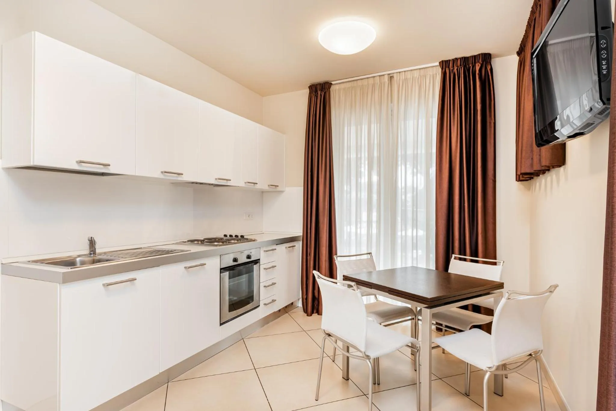 Kitchen or kitchenette in Hotel & Residence Exclusive