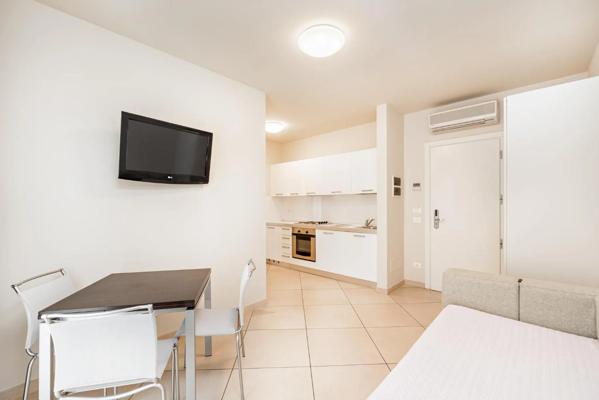 Living room, Bed in Hotel & Residence Exclusive