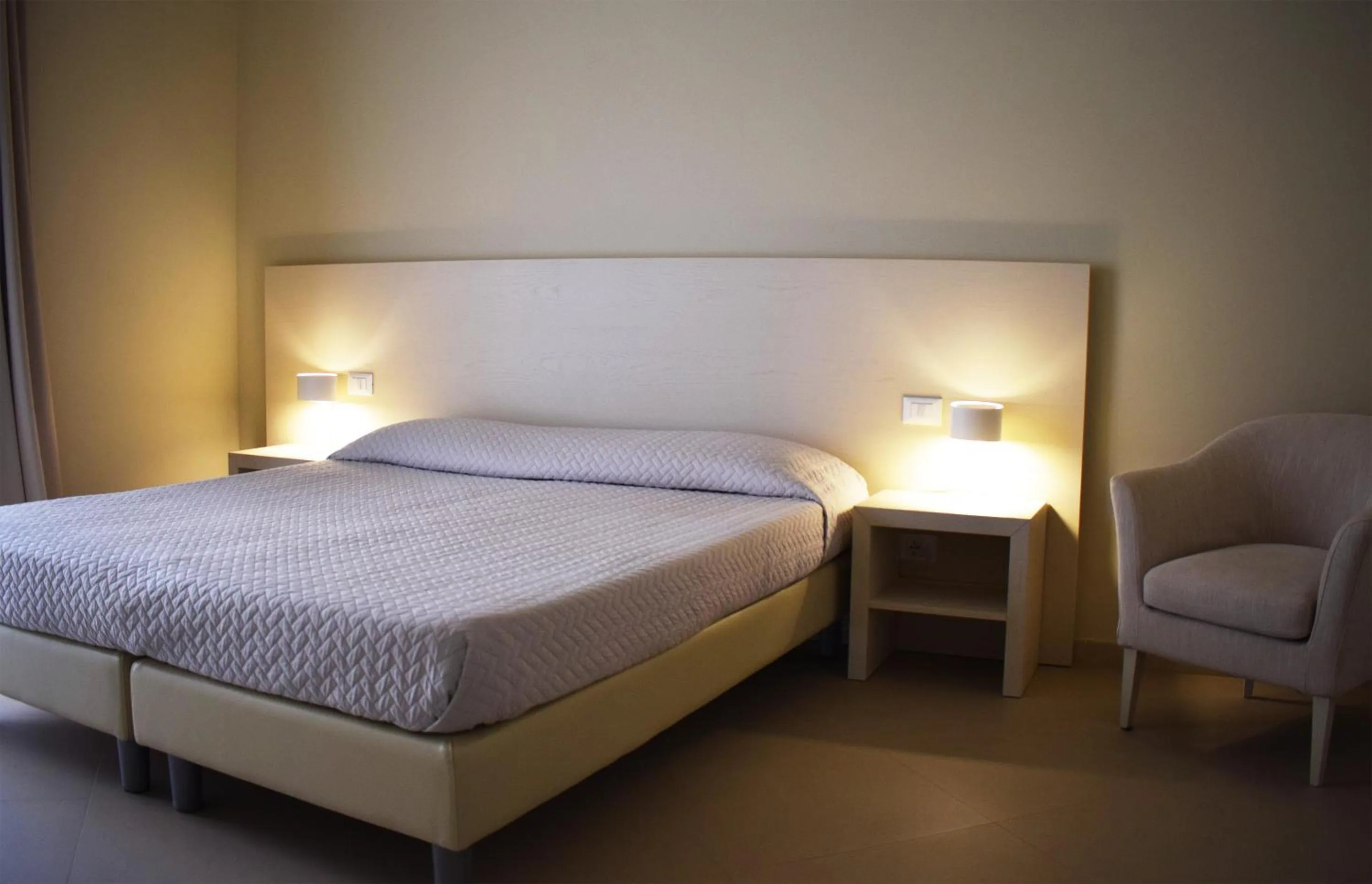 Bed in Hotel & Residence Exclusive