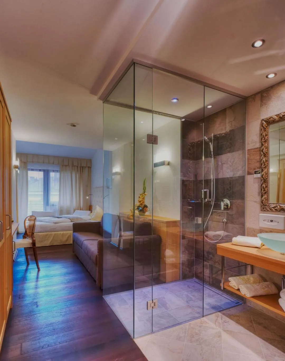 Shower, Bed in Hotel Leitner