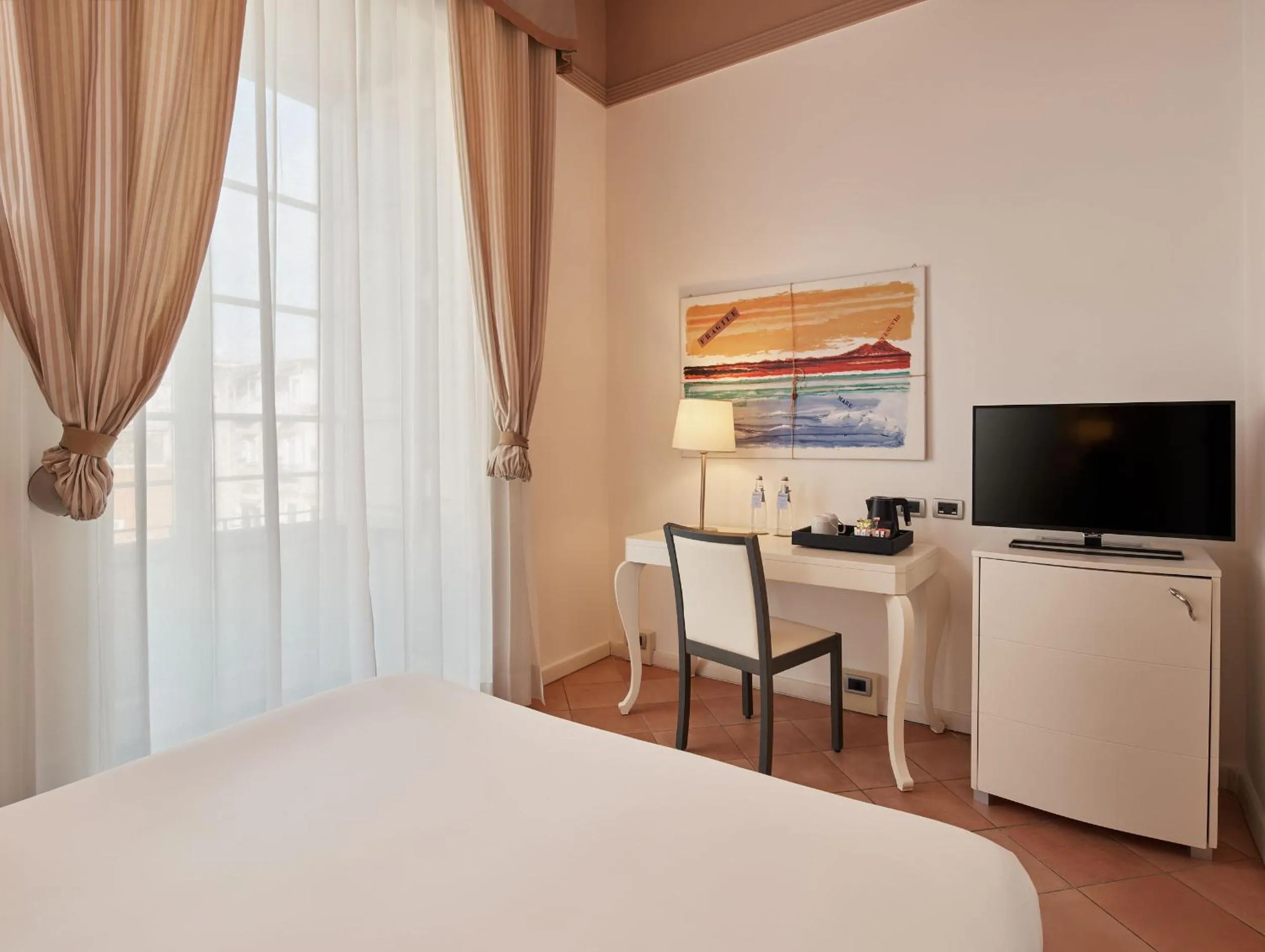 View (from property/room), Bed in Palazzo Caracciolo Naples