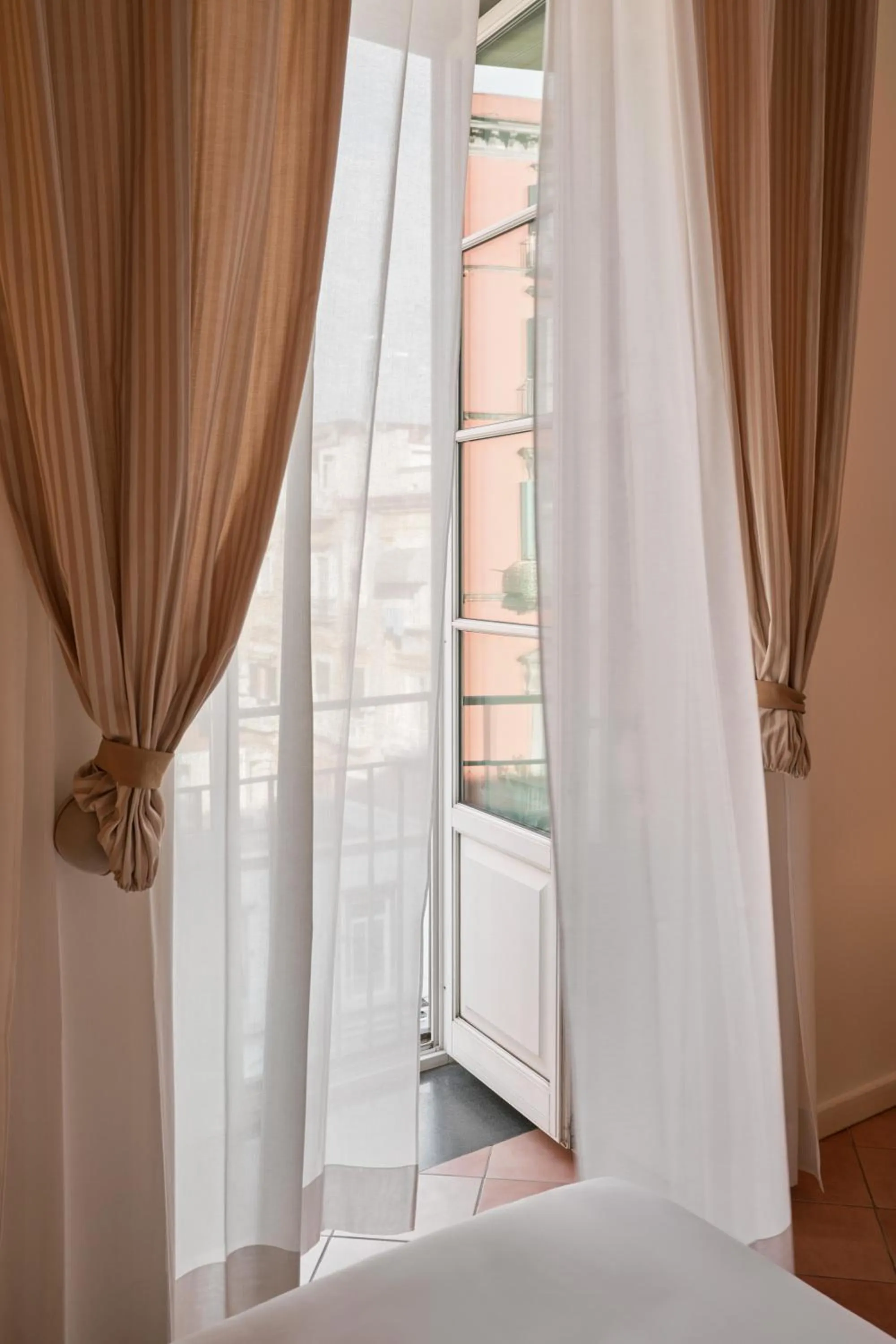 View (from property/room), Bed in Palazzo Caracciolo Naples