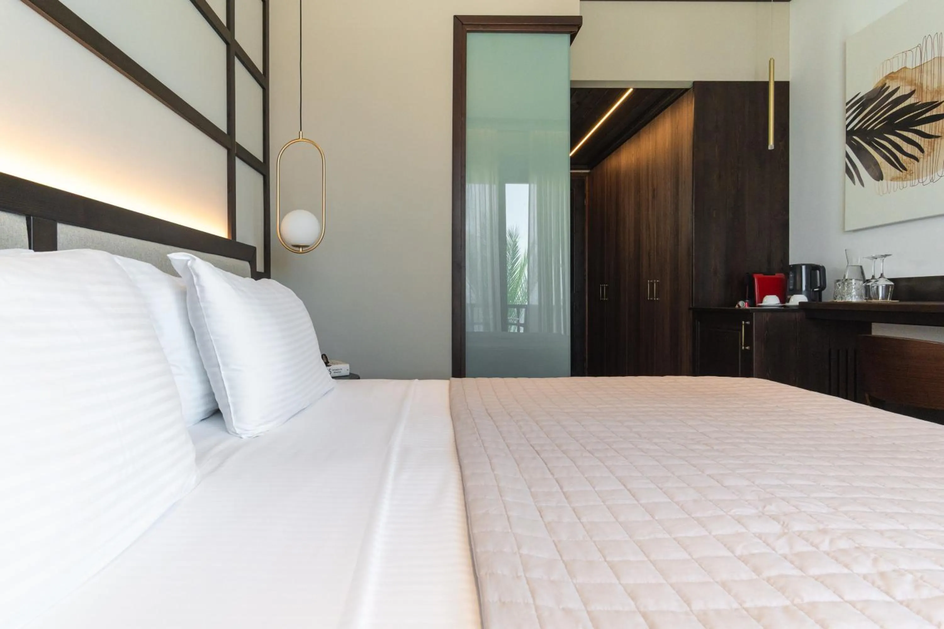 Bed in Sunrise Hotel