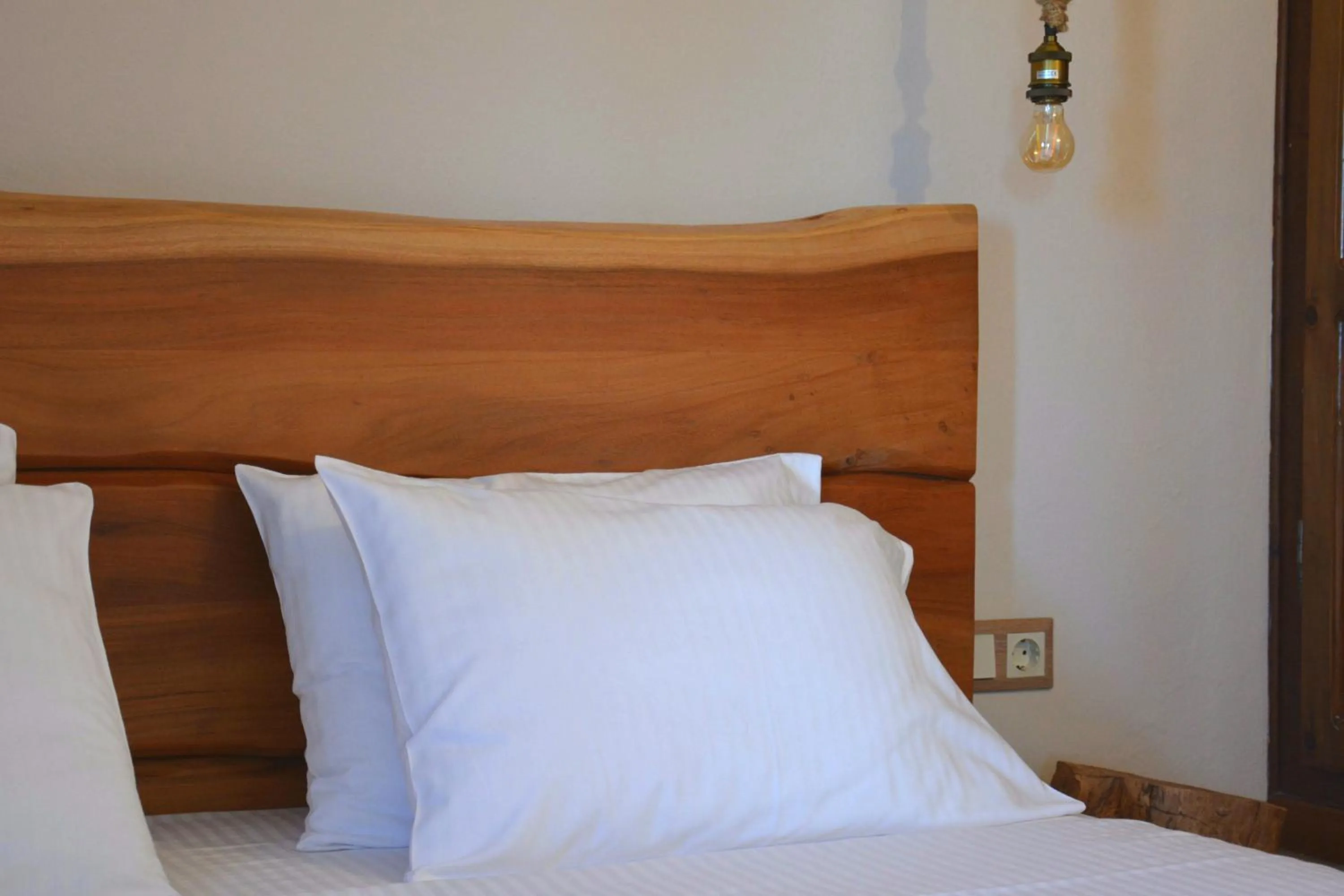 Bed in Sunrise Hotel