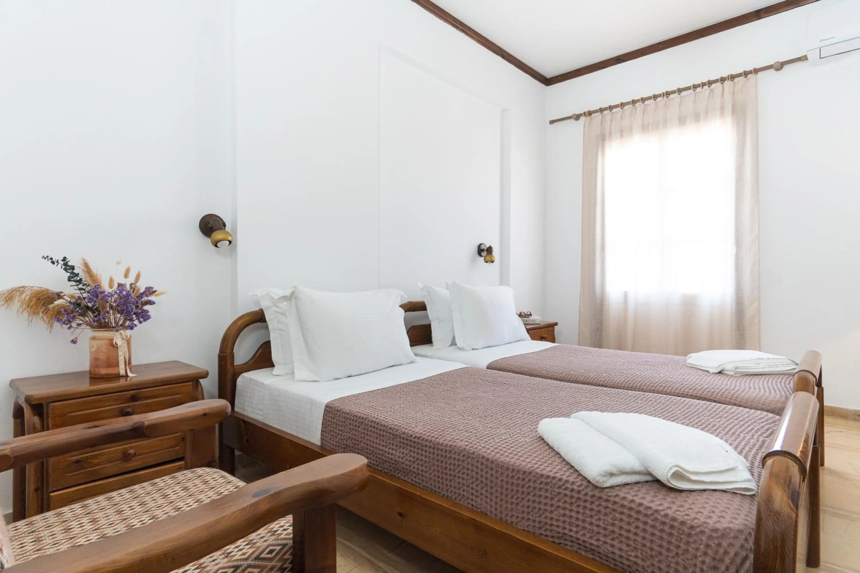 Bed in Sunrise Hotel