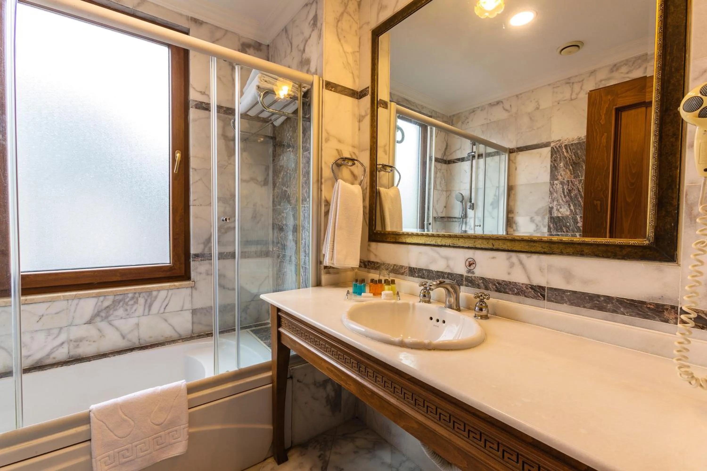 Bathroom in Acra Hotel - Special Category