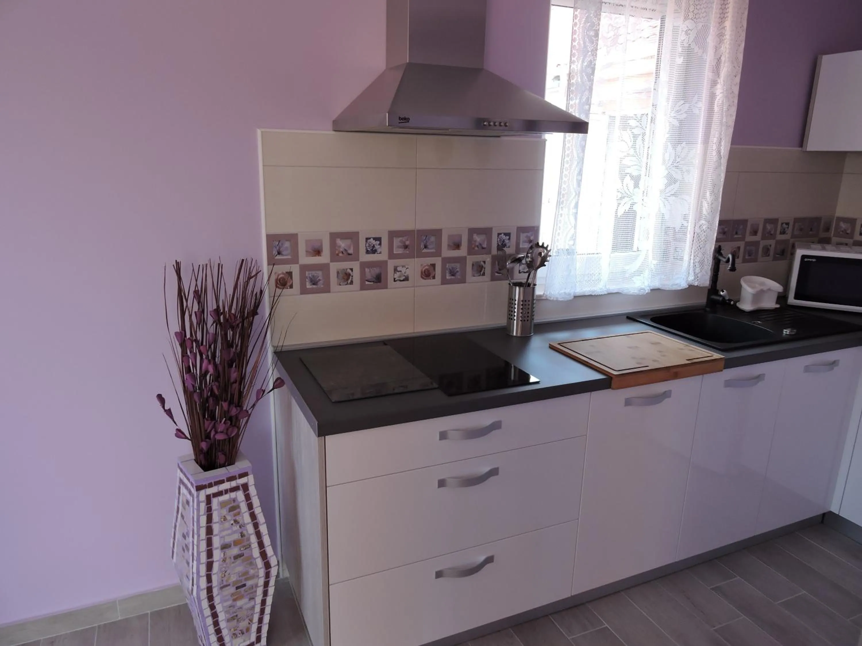 Kitchen or kitchenette in Apartments Perla