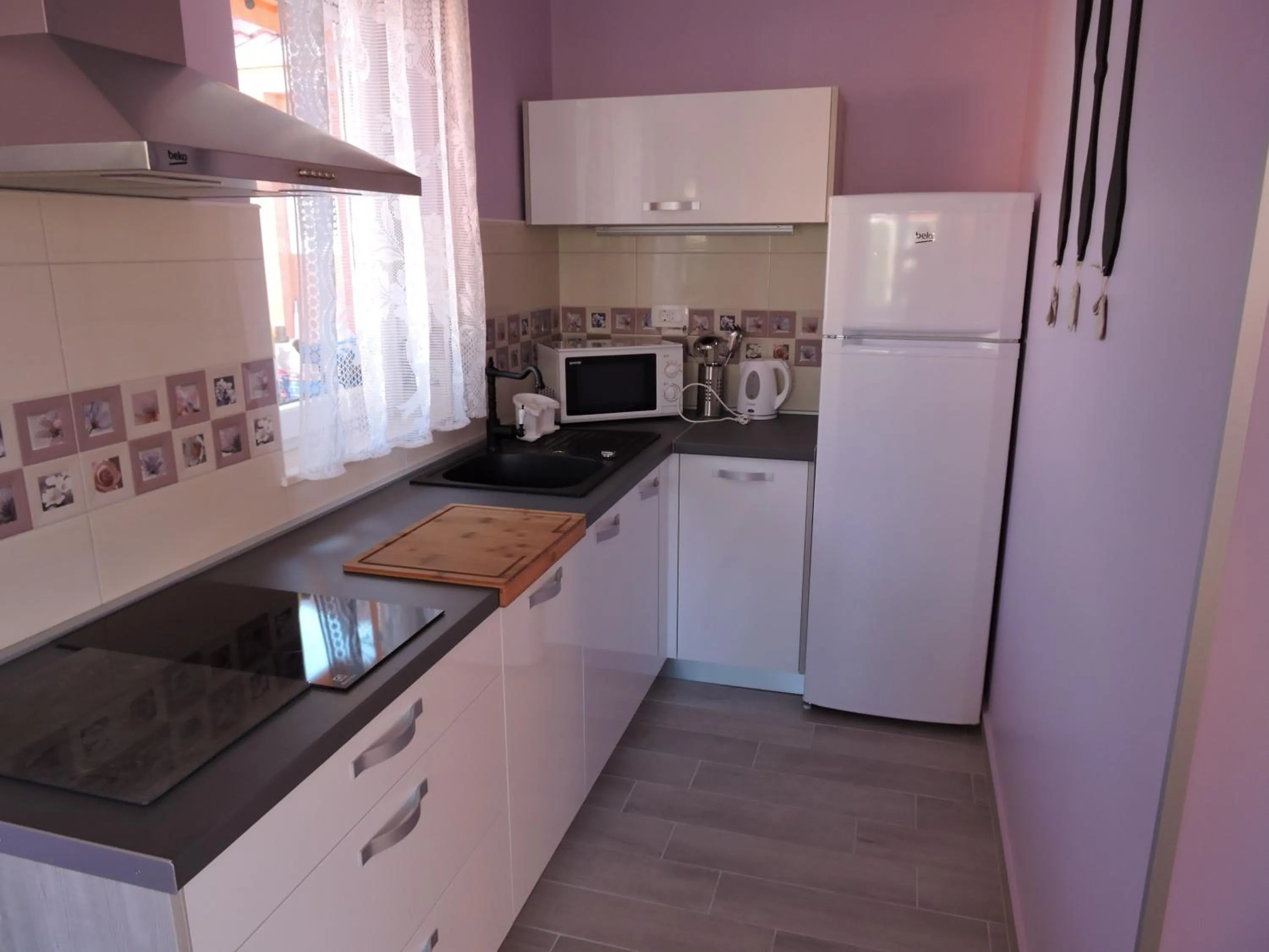 Kitchen or kitchenette in Apartments Perla