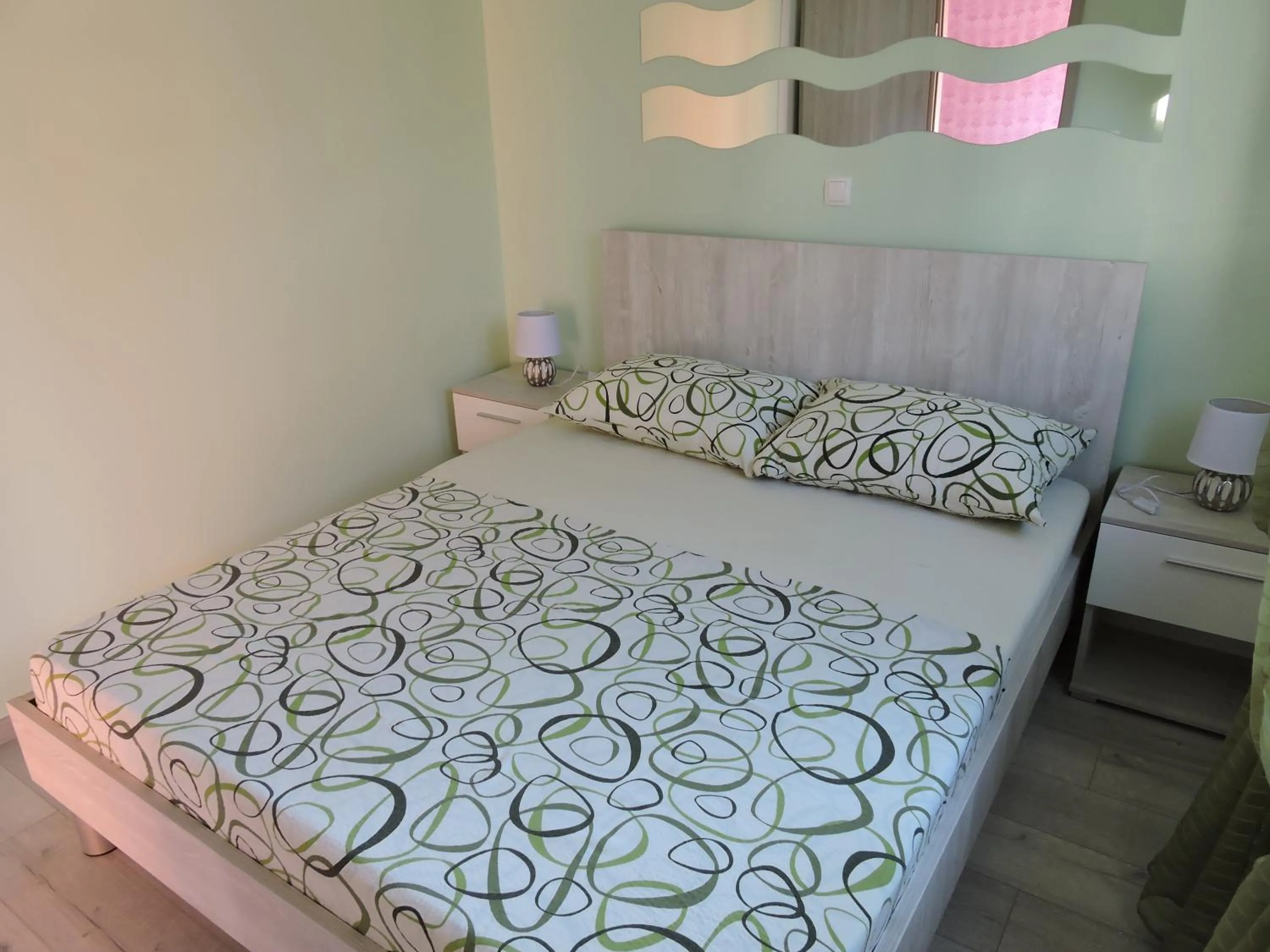 Bed in Apartments Perla
