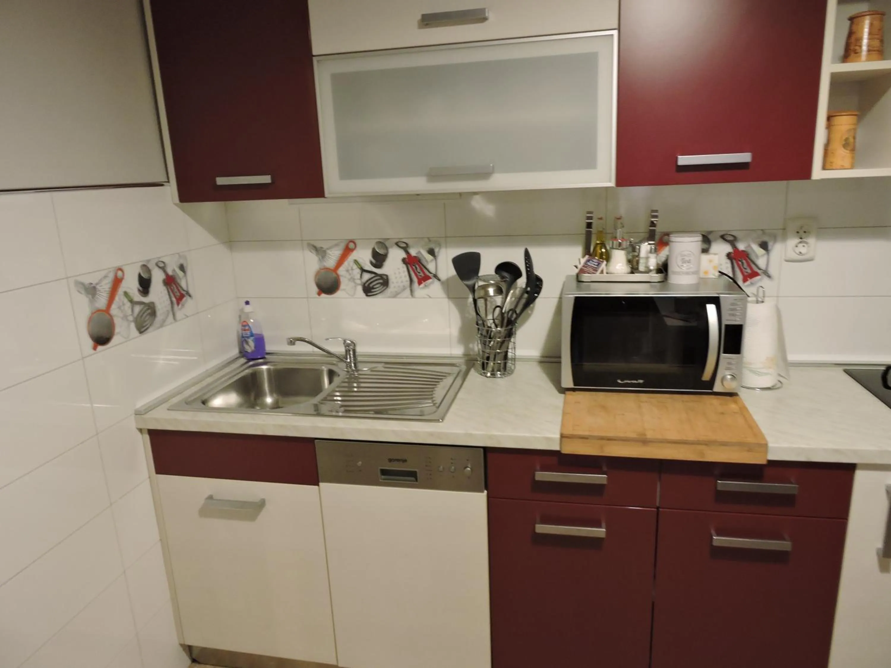 Kitchen or kitchenette in Apartments Perla