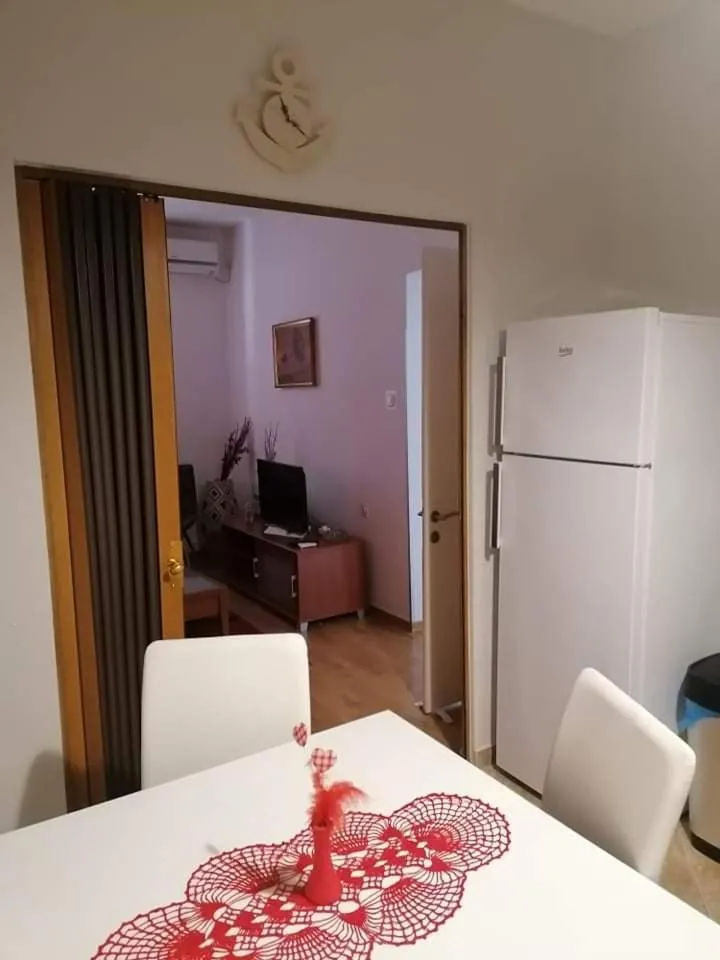 Kitchen or kitchenette, Bed in Apartments Perla