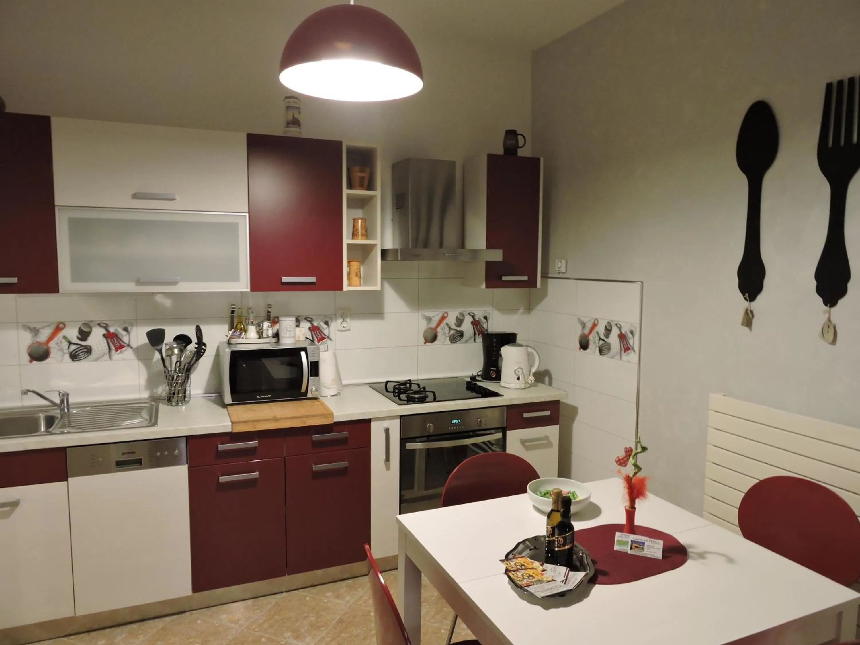 Kitchen or kitchenette in Apartments Perla