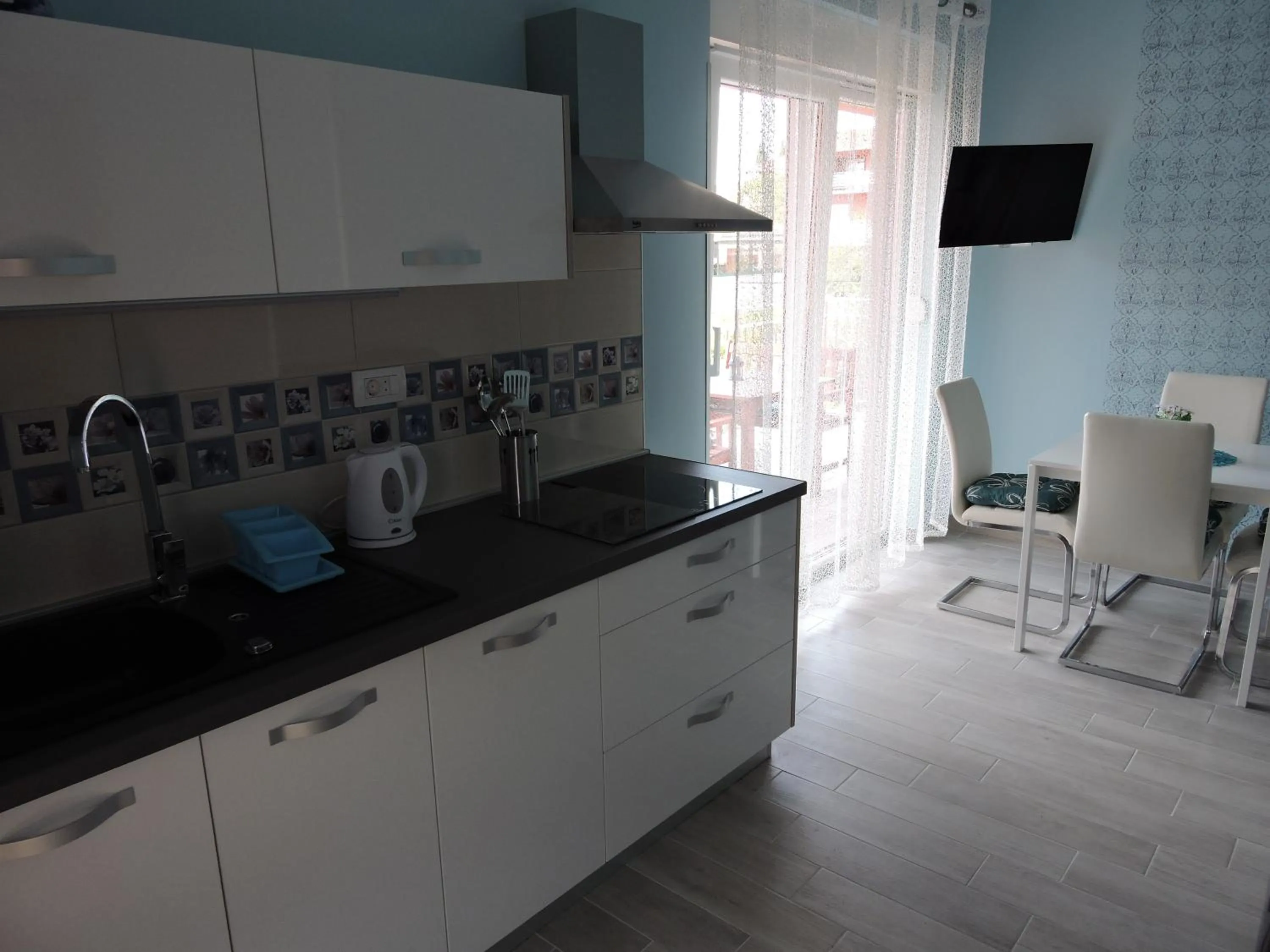 Kitchen or kitchenette in Apartments Perla