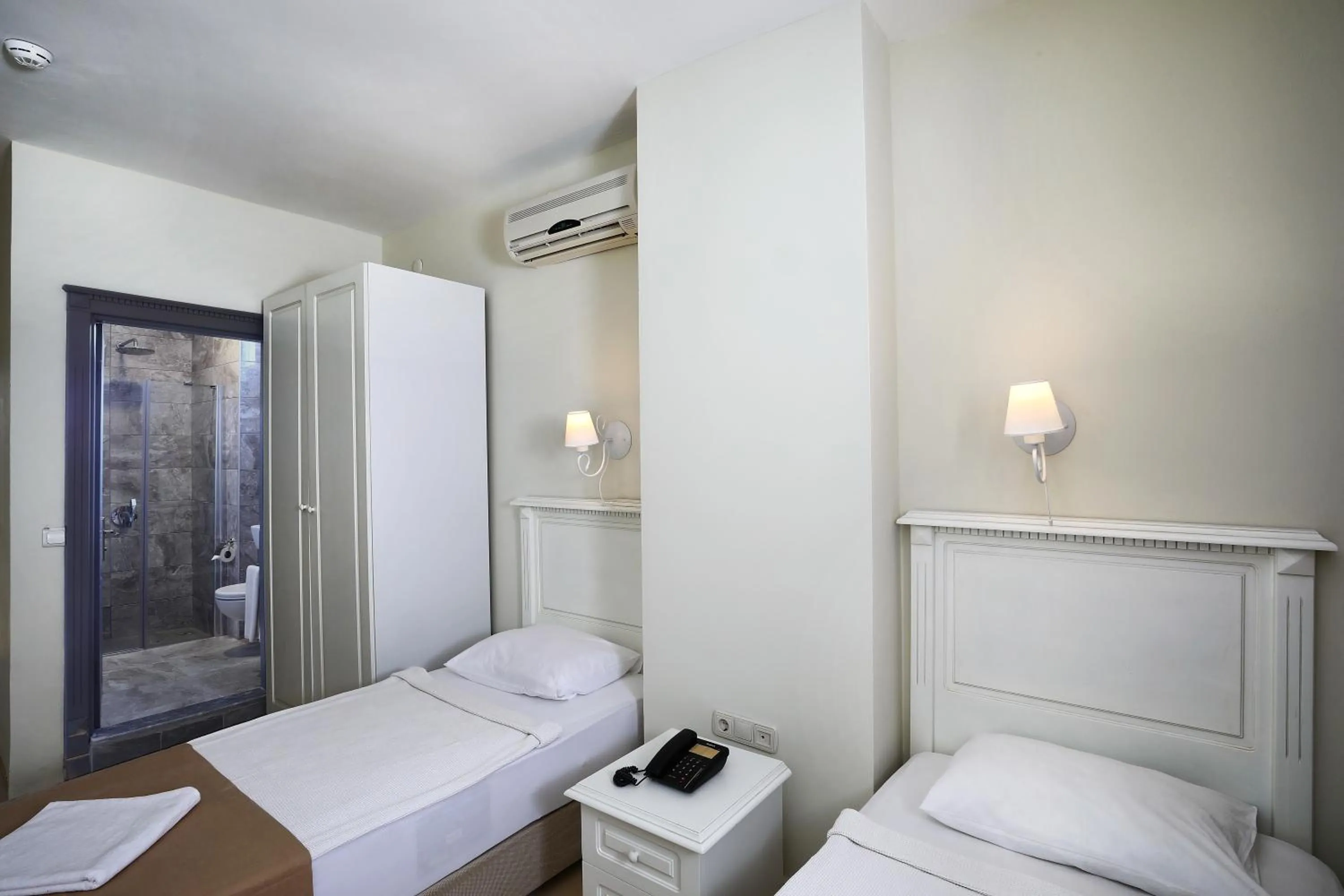 Bedroom in Summer Garden Suites Beach Hotel