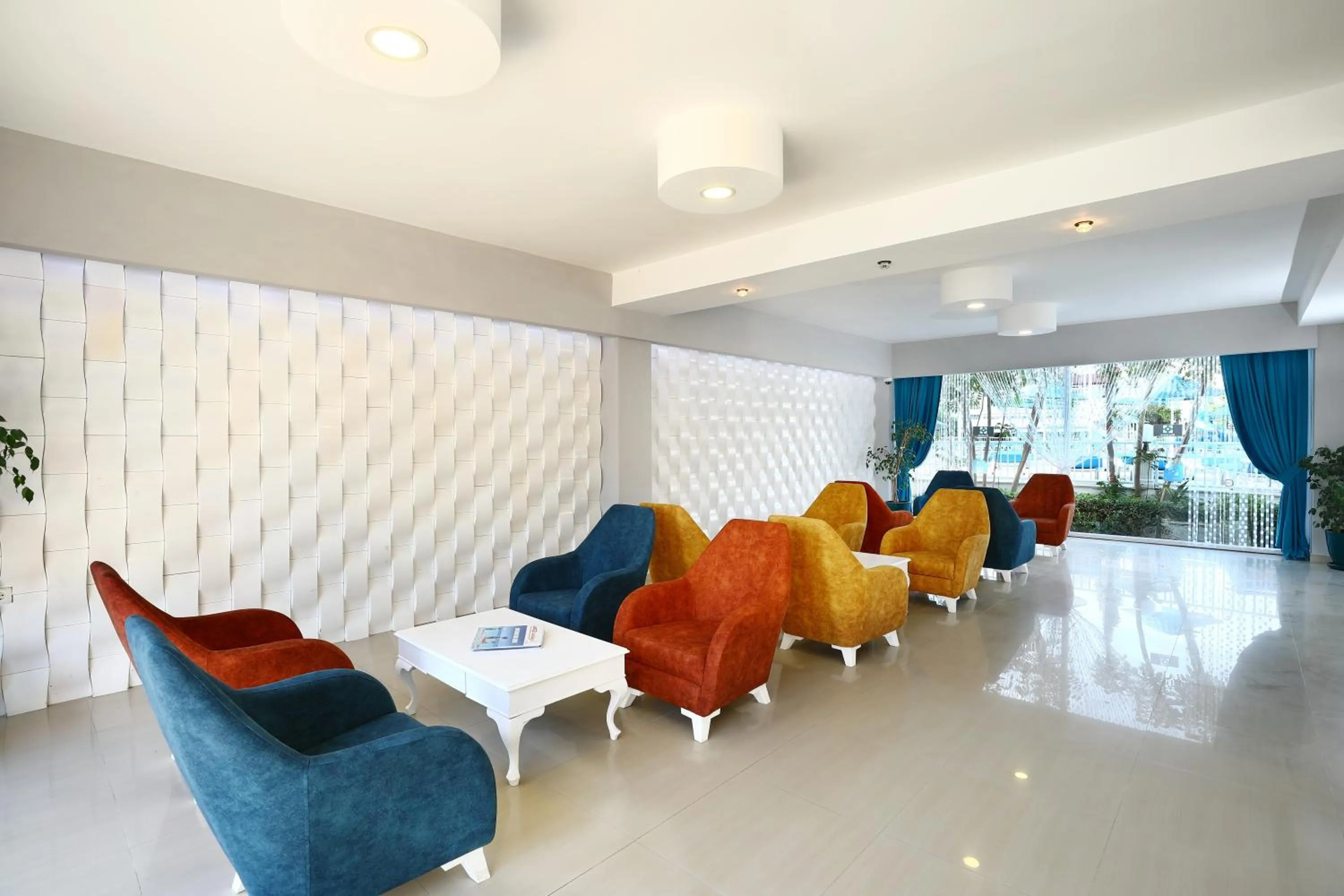 Seating area in Summer Garden Suites Beach Hotel