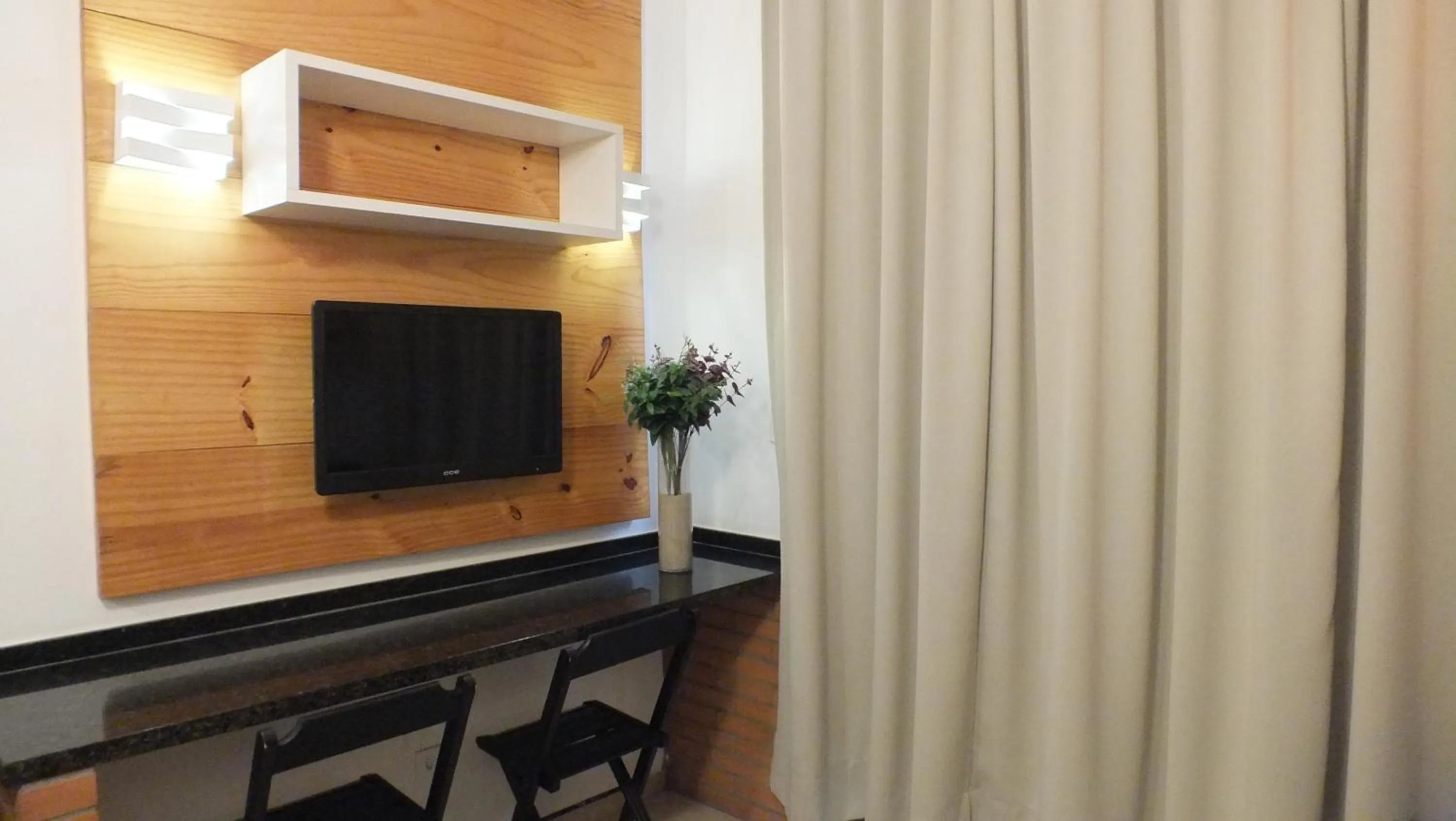 TV and multimedia in BH Studios Hotel Brás