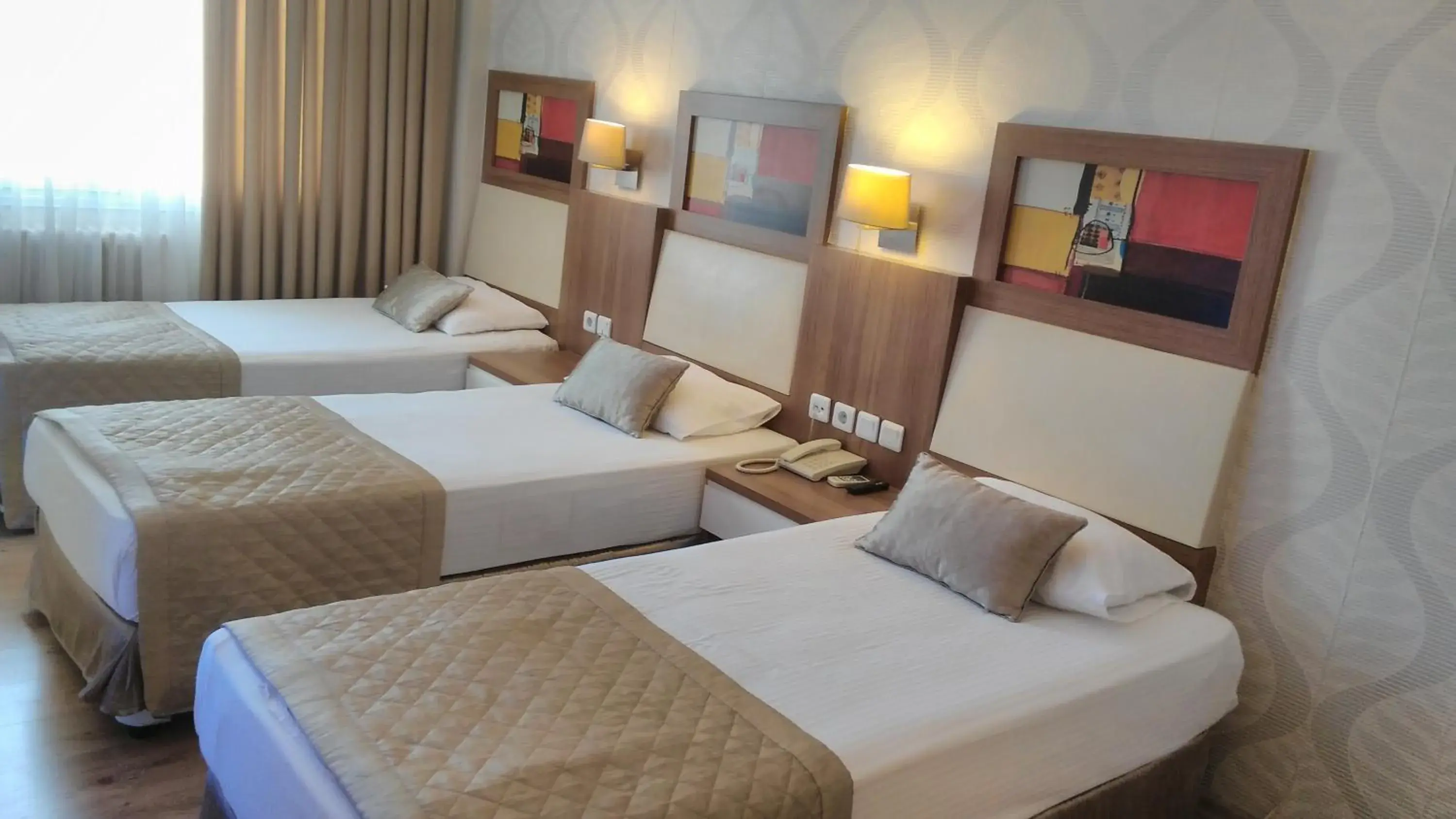 Quadruple Room in Hotel Baylan İzmir Quadruple Room in Hotel Baylan İzmir