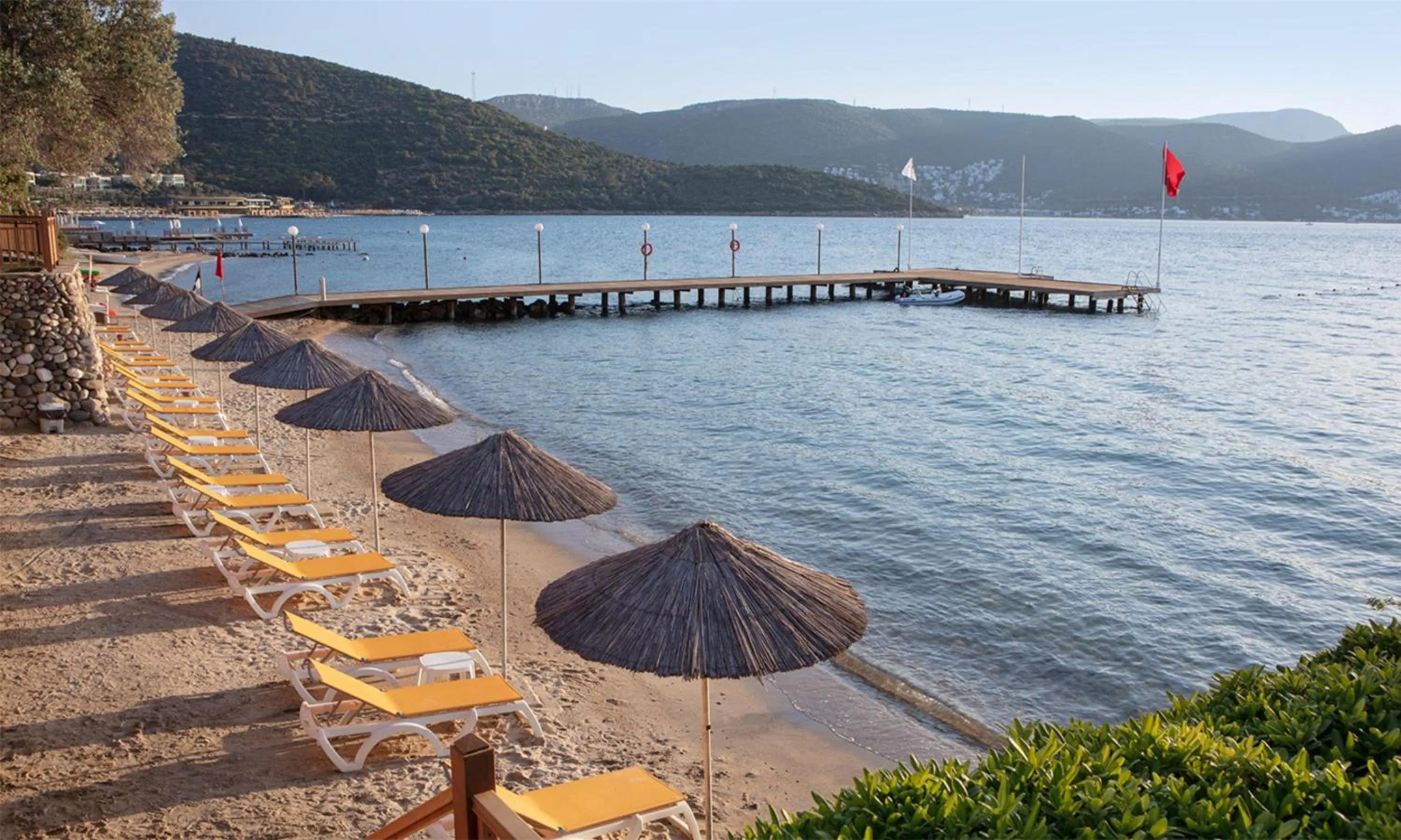 Beach in DoubleTree by Hilton Bodrum Isil Club Ultra All-Inclusive Resort
