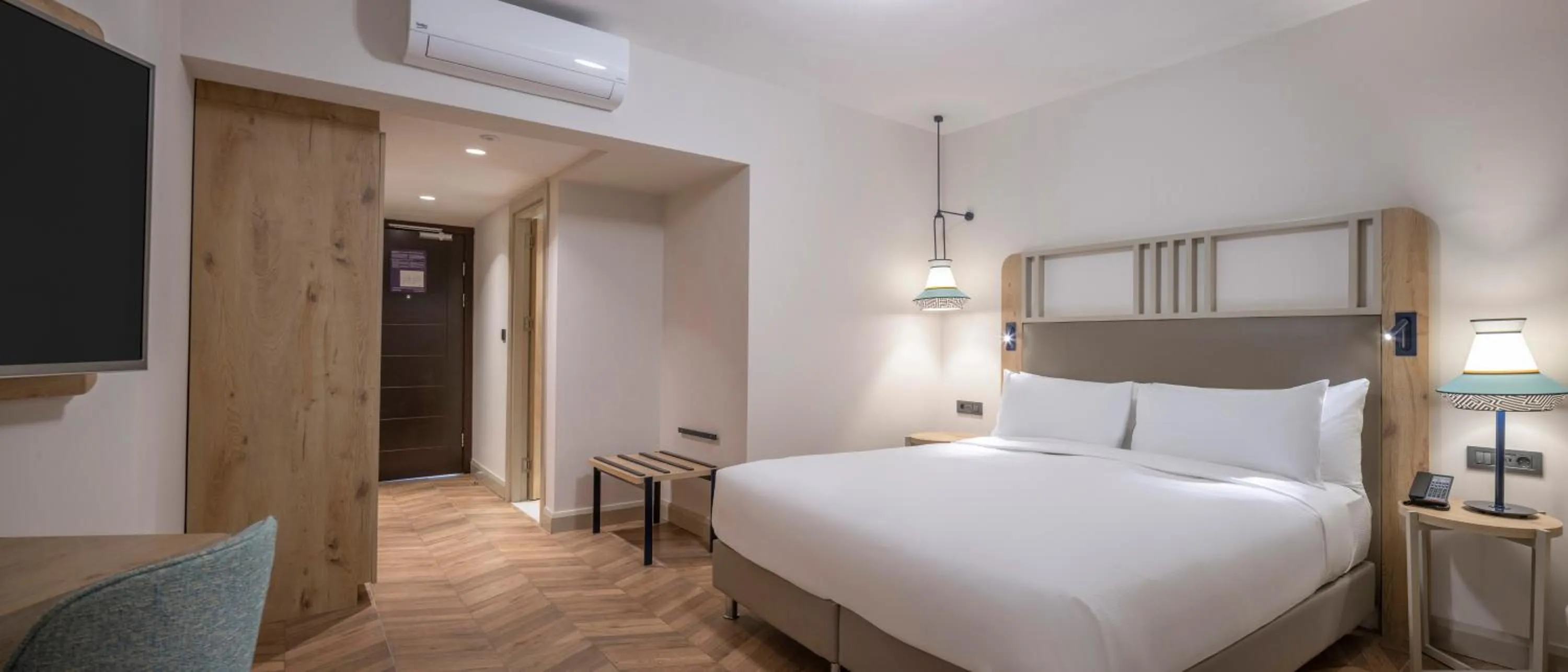 Bedroom, Bed in DoubleTree by Hilton Bodrum Isil Club Ultra All-Inclusive Resort