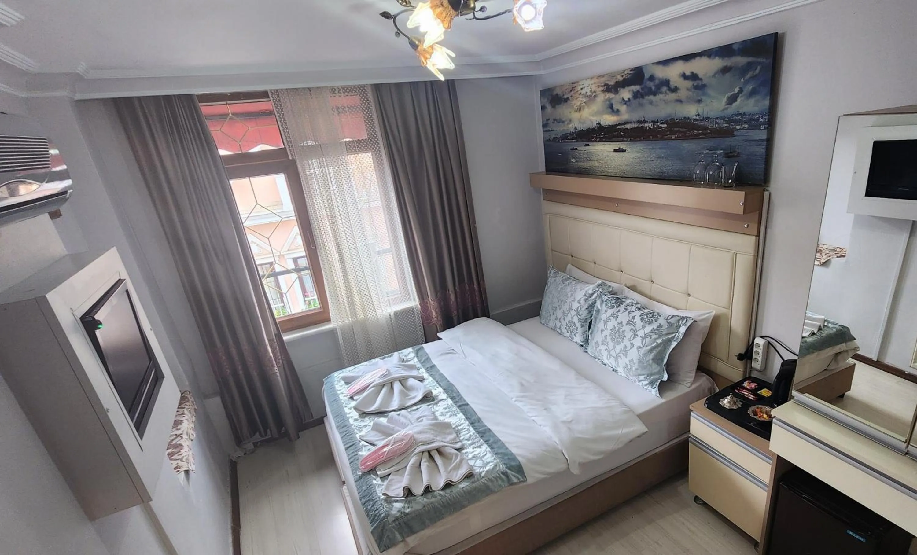 Bed in Oceans 7 Hotel