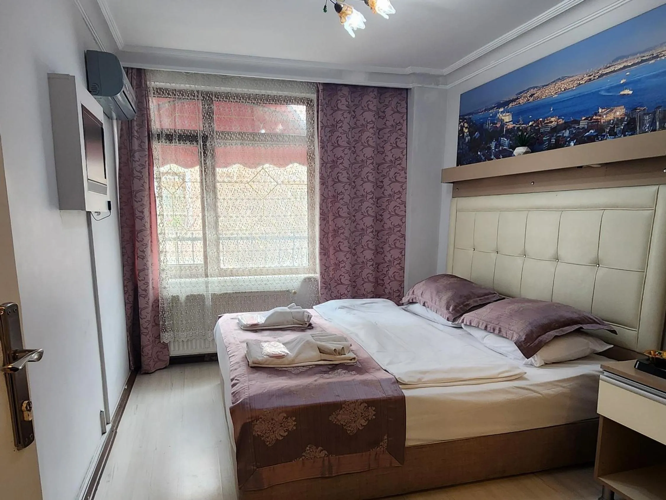 Bed in Oceans 7 Hotel