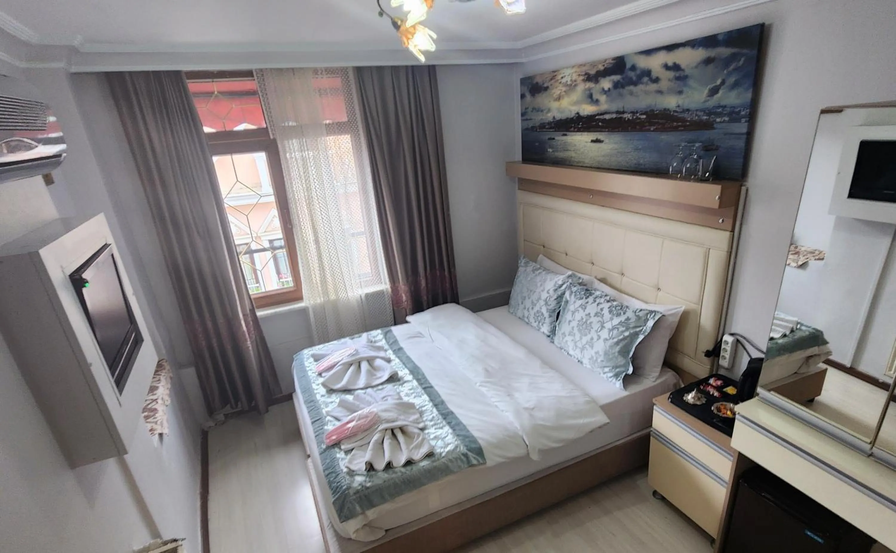 Bed in Oceans 7 Hotel