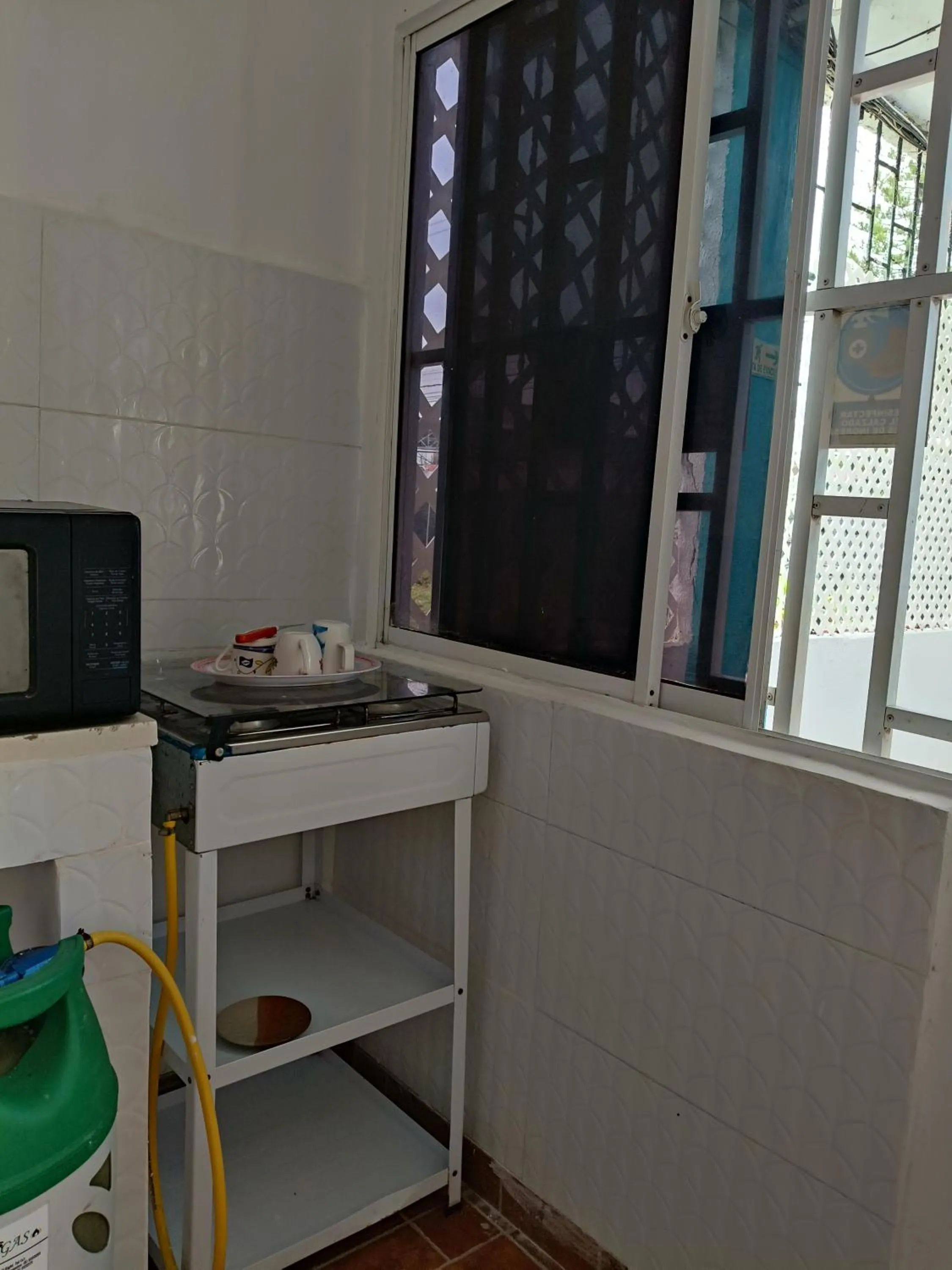 Kitchen or kitchenette in Posada Miss Joyce House