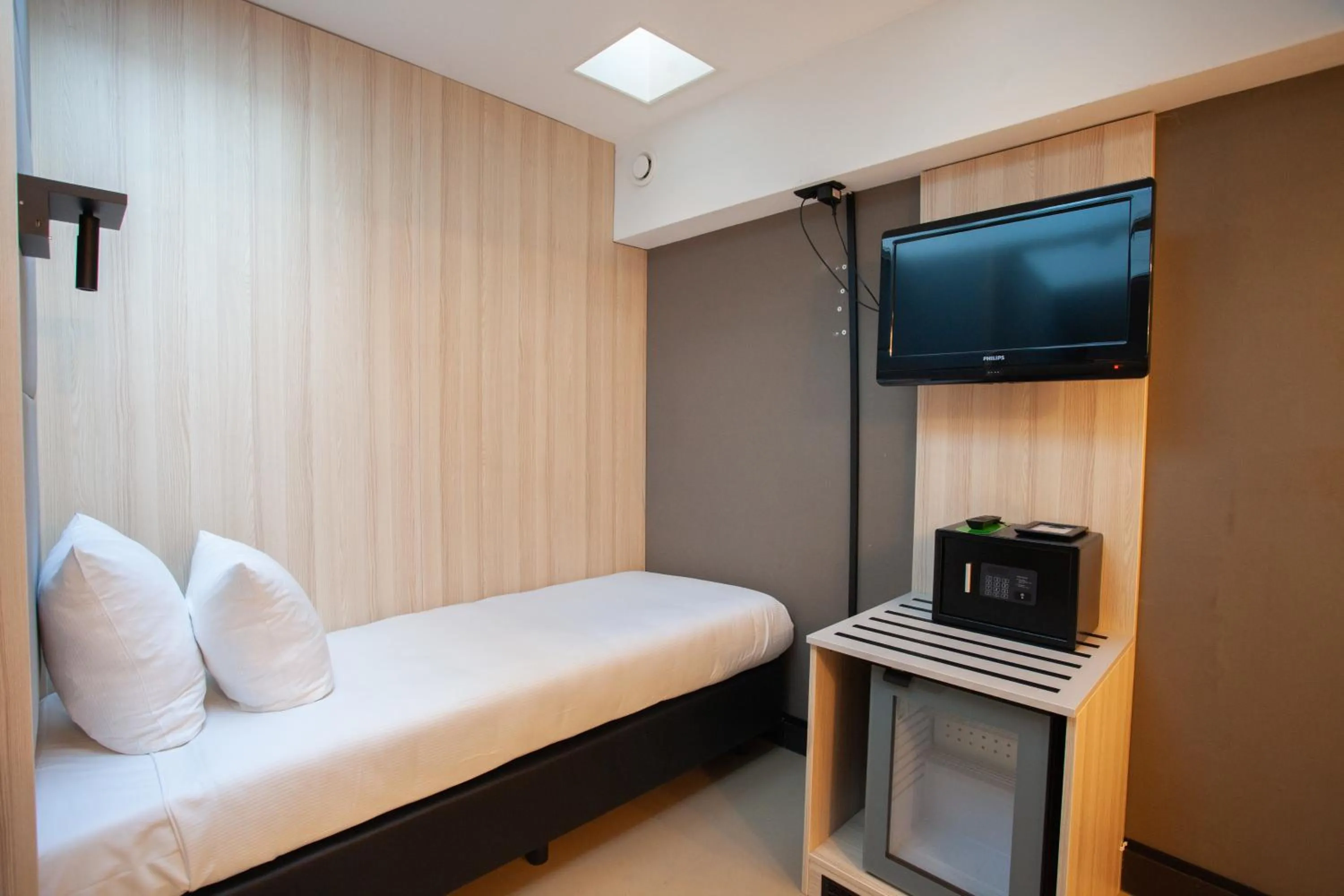 Bed in The Alfred Hotel