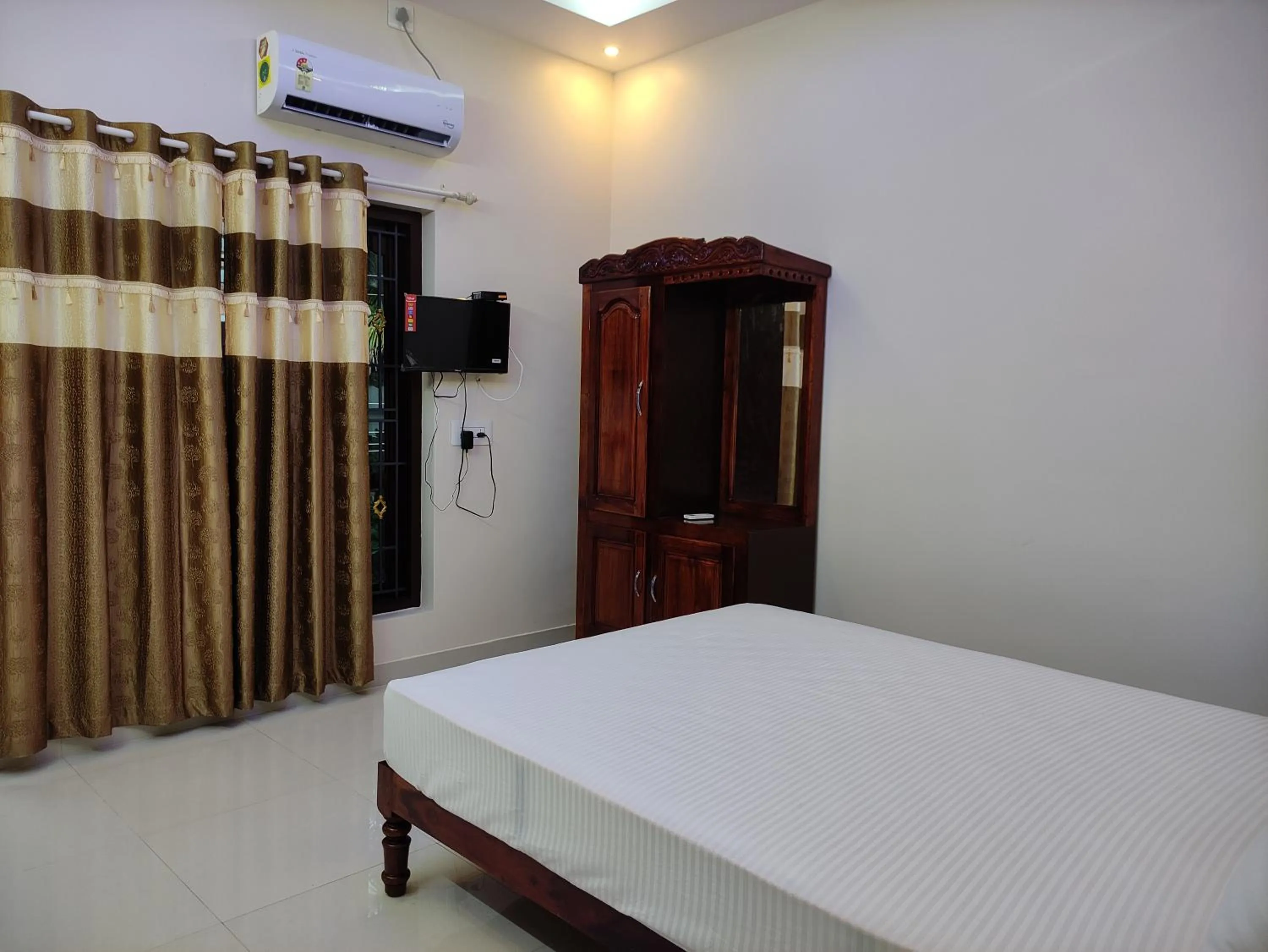 Bed in Kayaloram Resort