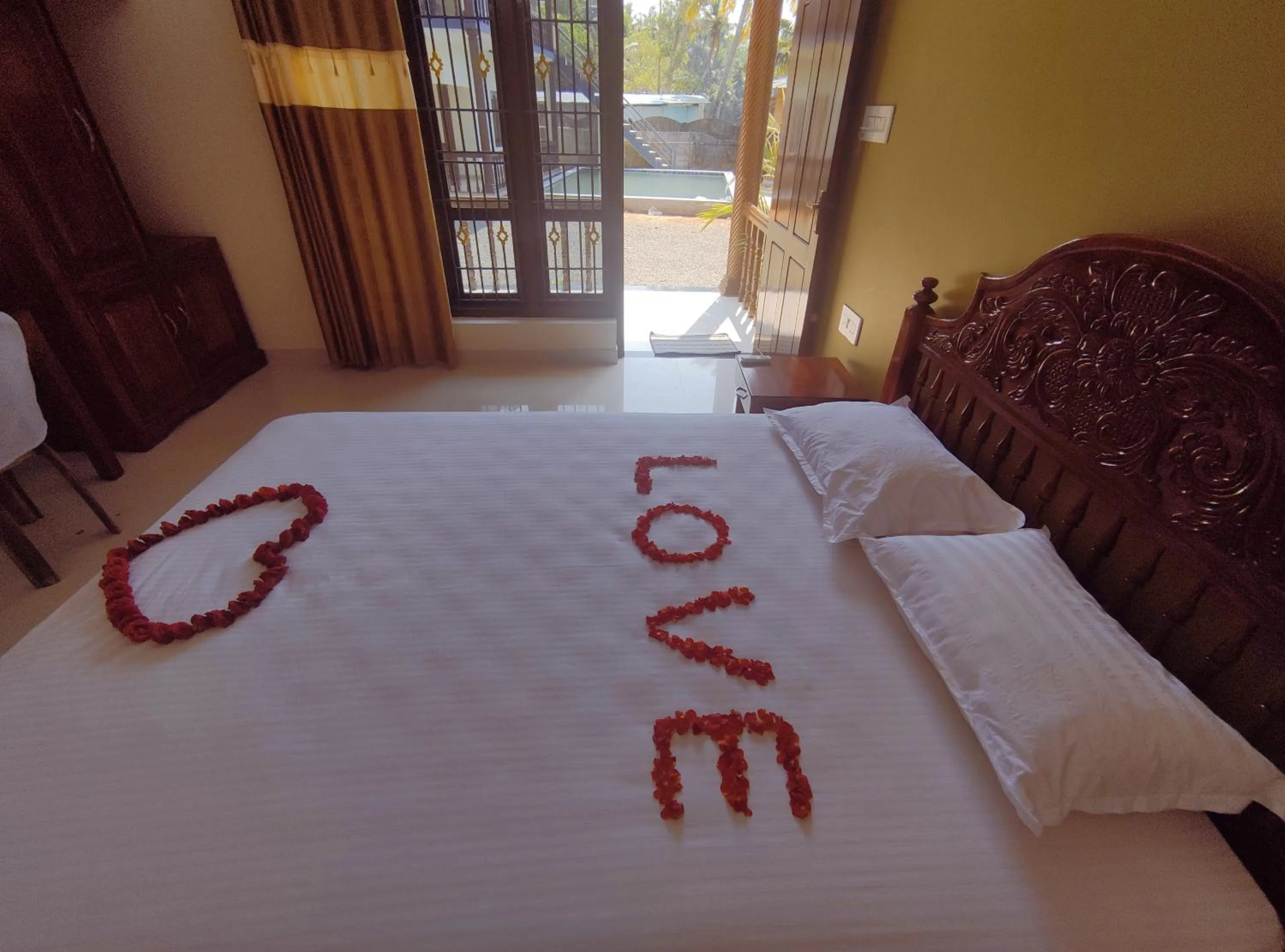 Bed in Kayaloram Resort