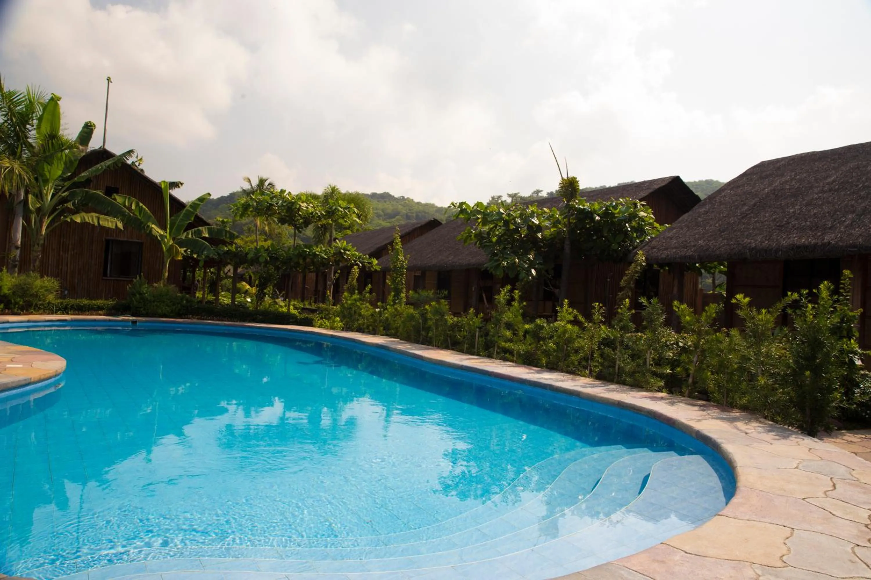 Swimming pool in Calayo Beach Resort