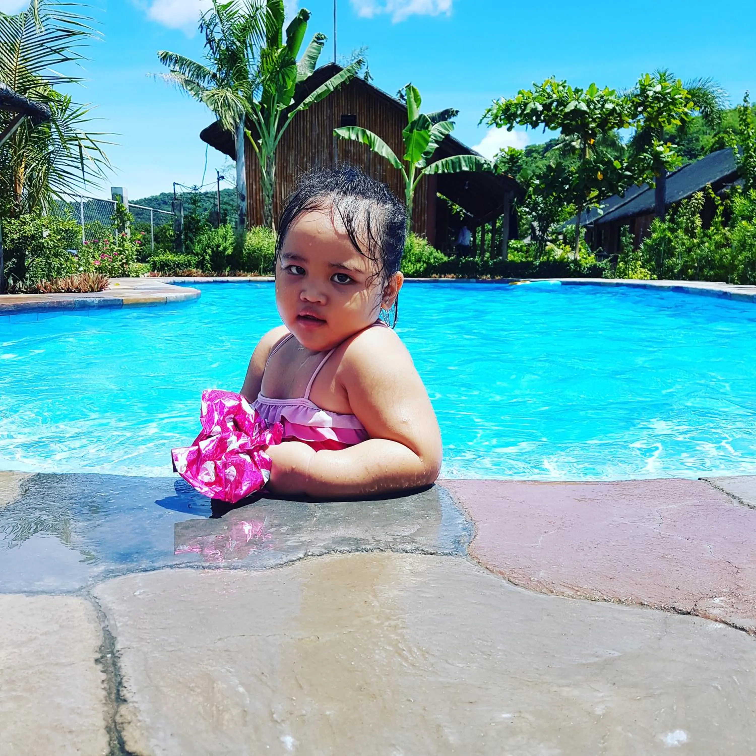Swimming pool in Calayo Beach Resort