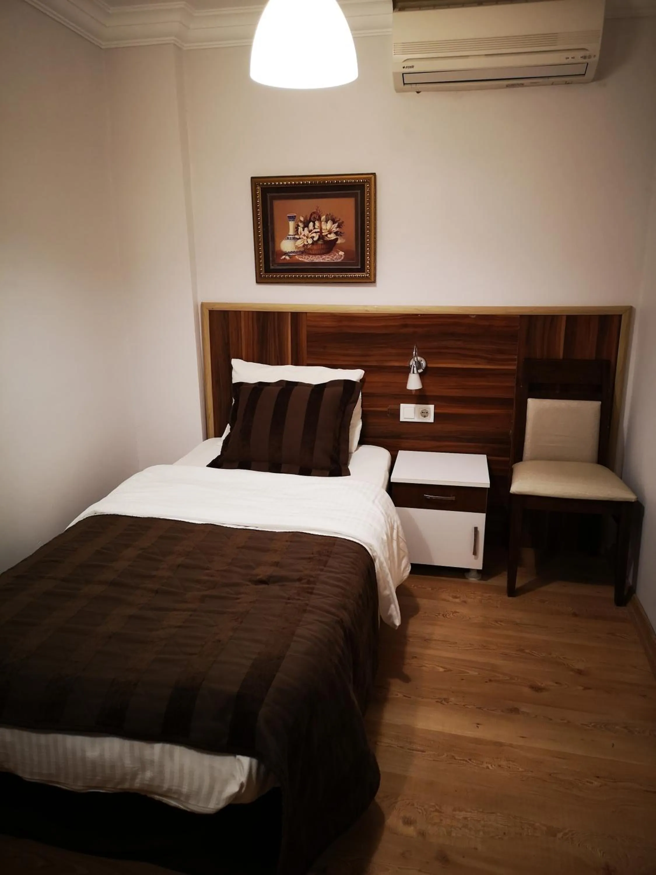 Photo of the whole room, Bed in Angels Garden Hotel - Special Catagory