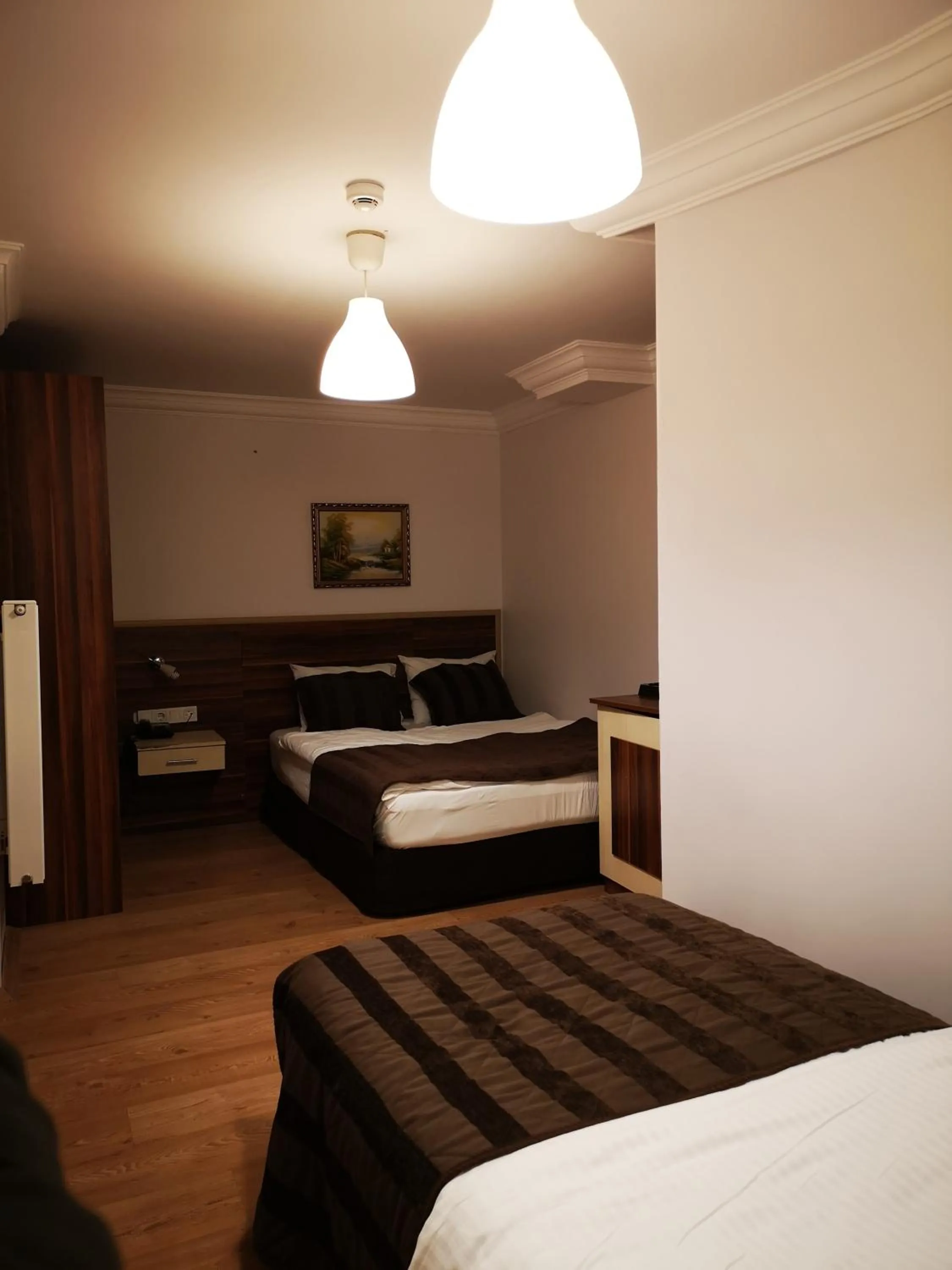 Photo of the whole room, Bed in Angels Garden Hotel - Special Catagory