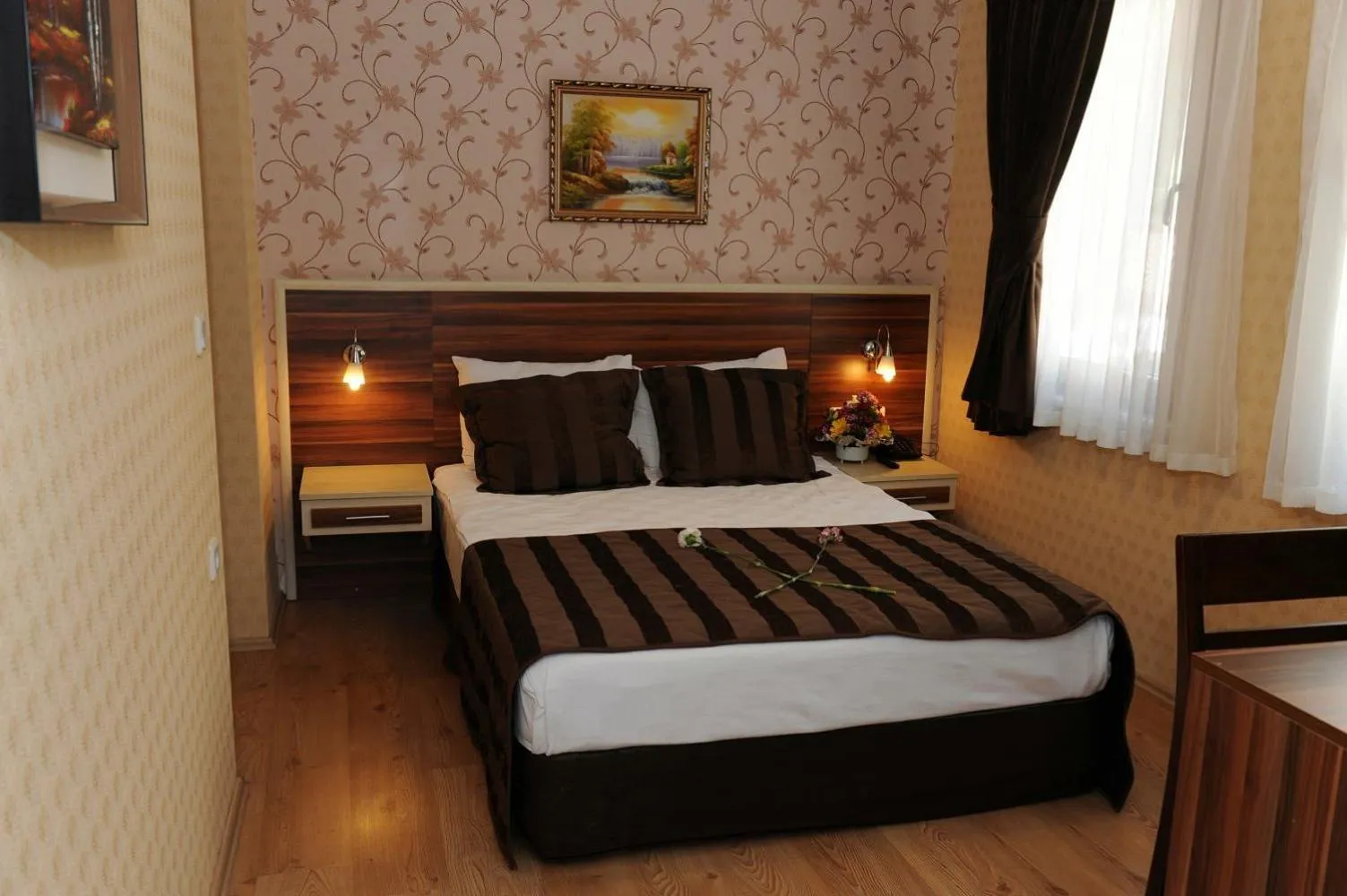 Photo of the whole room, Bed in Angels Garden Hotel - Special Catagory