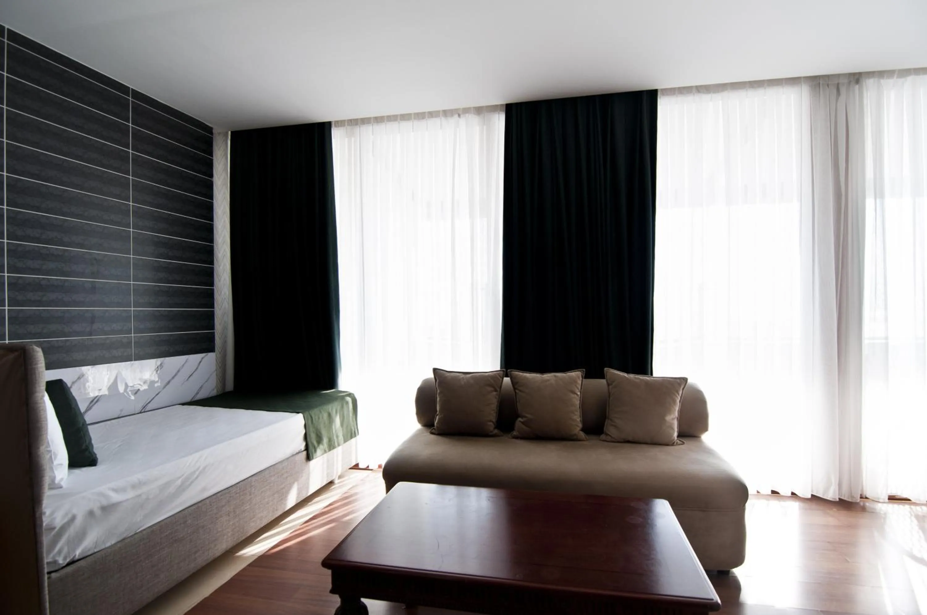 Seating area, Bed in Artefes Hotel Old City