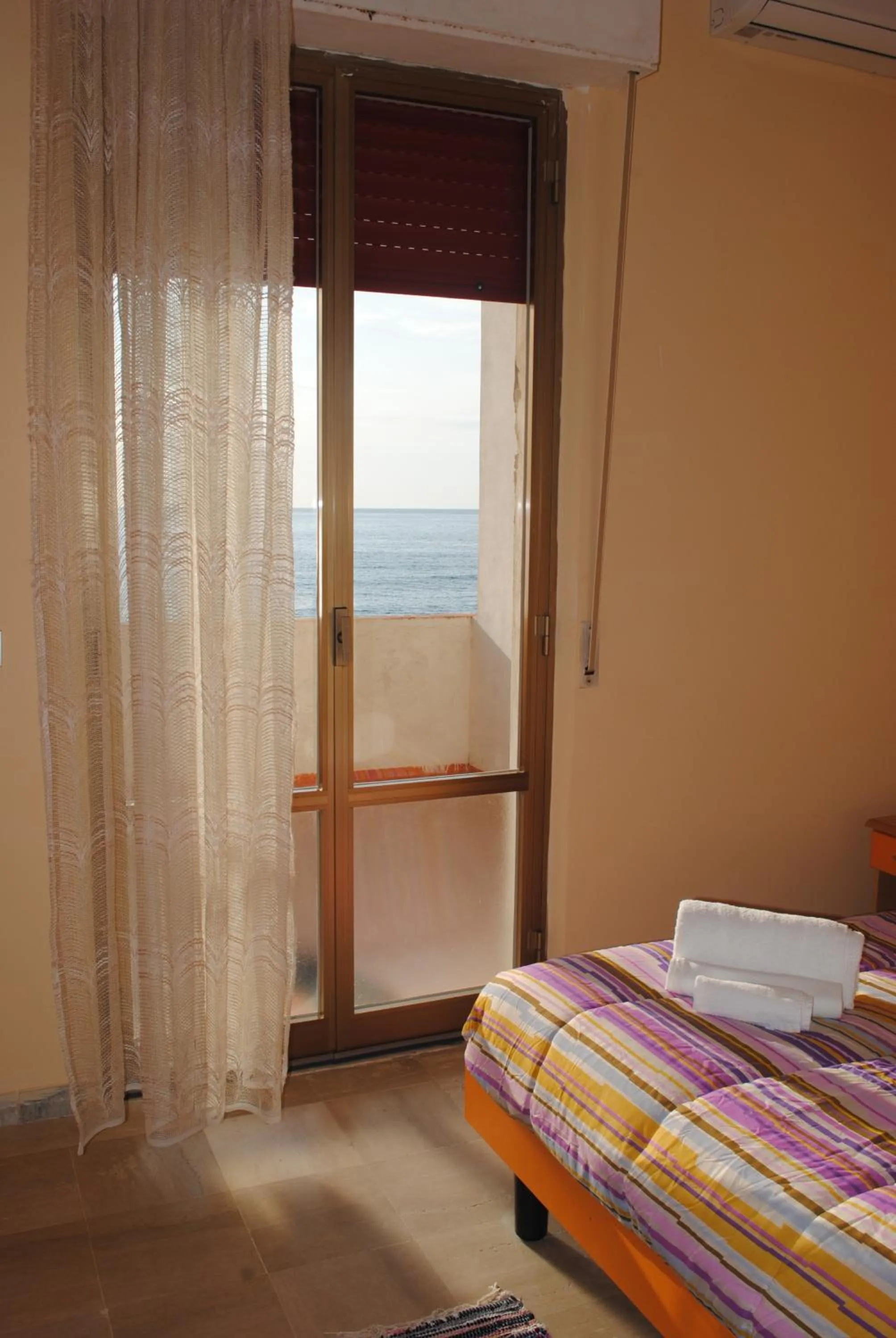 Bed in Hotel South Paradise