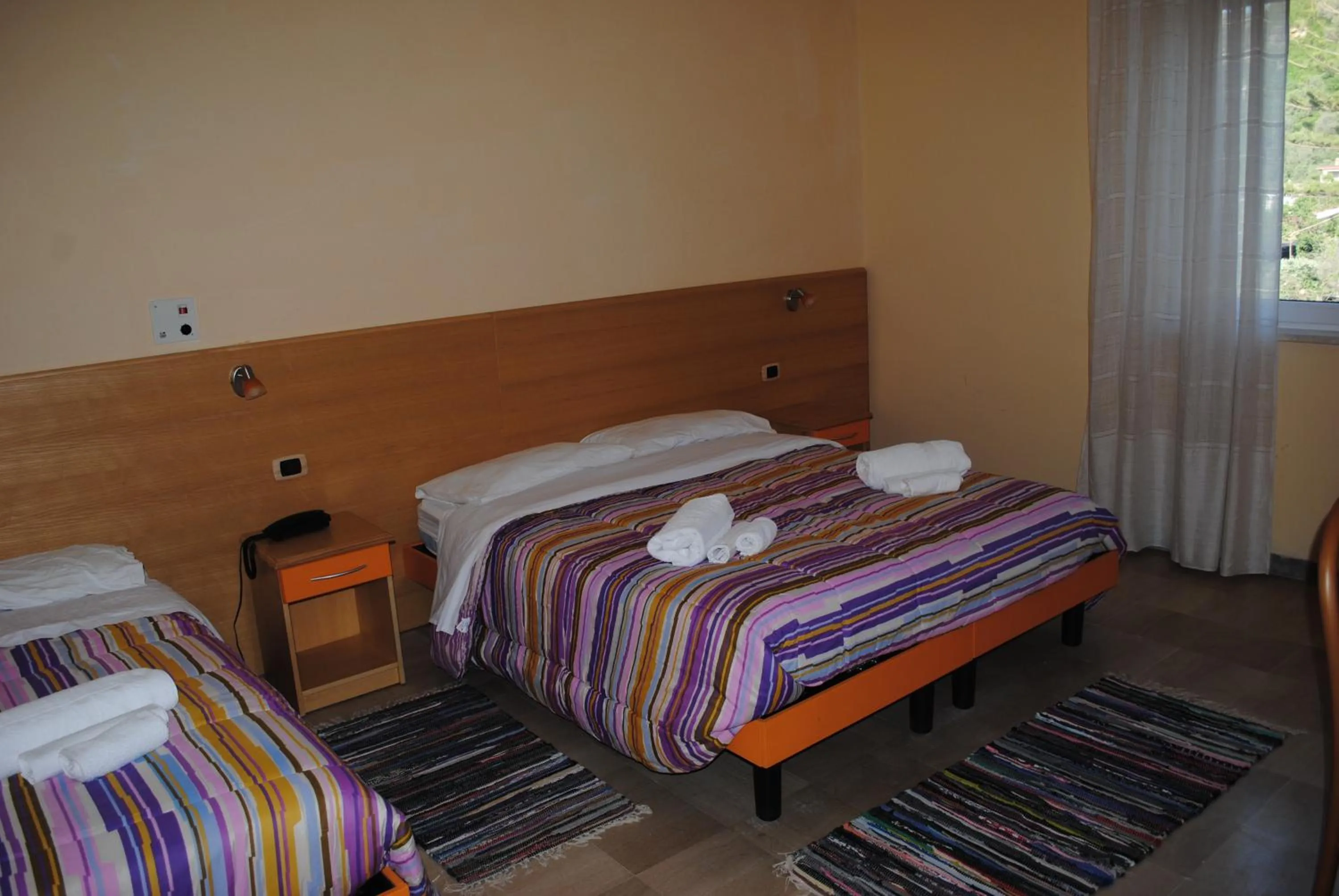 Bed in Hotel South Paradise