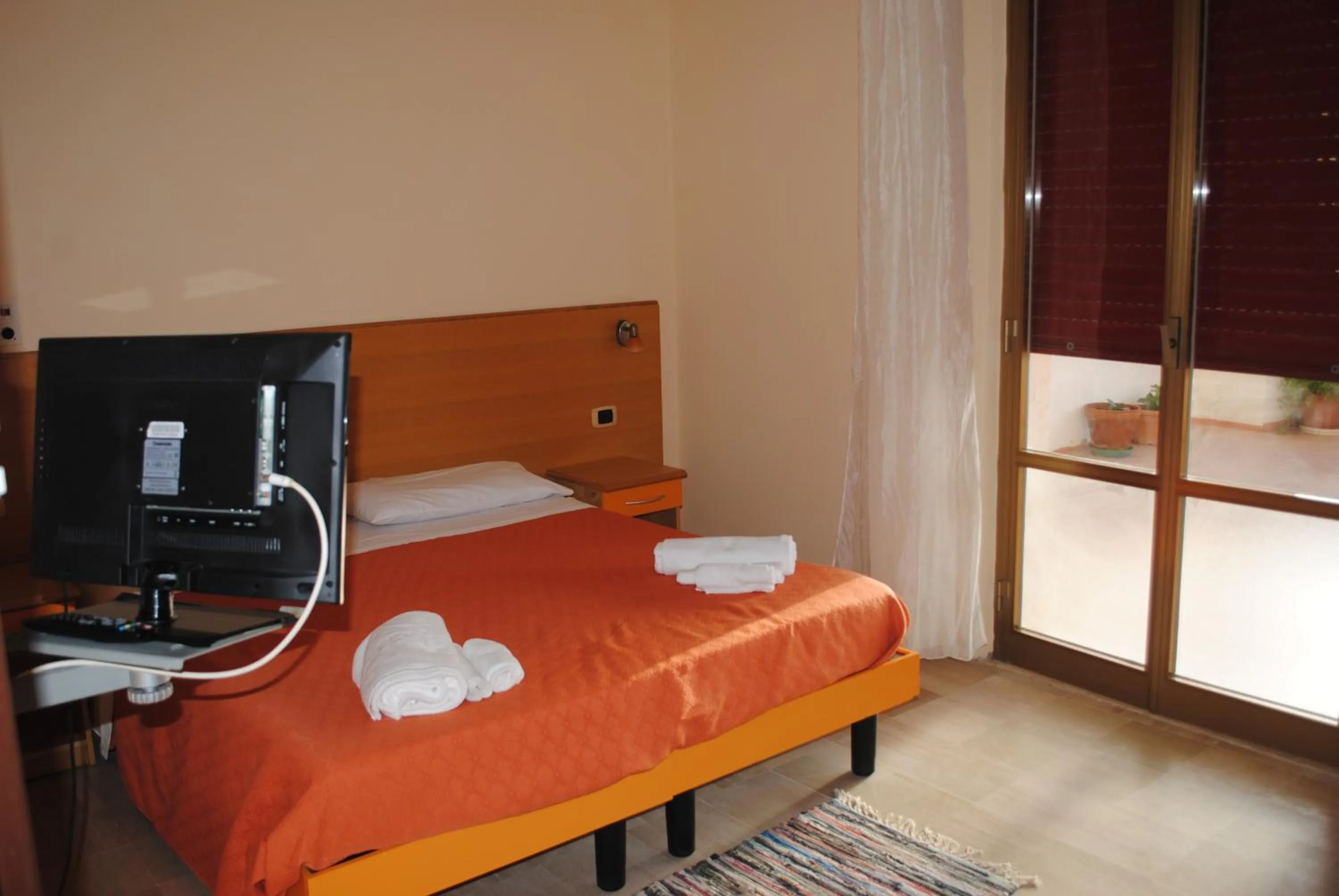 Bed in Hotel South Paradise