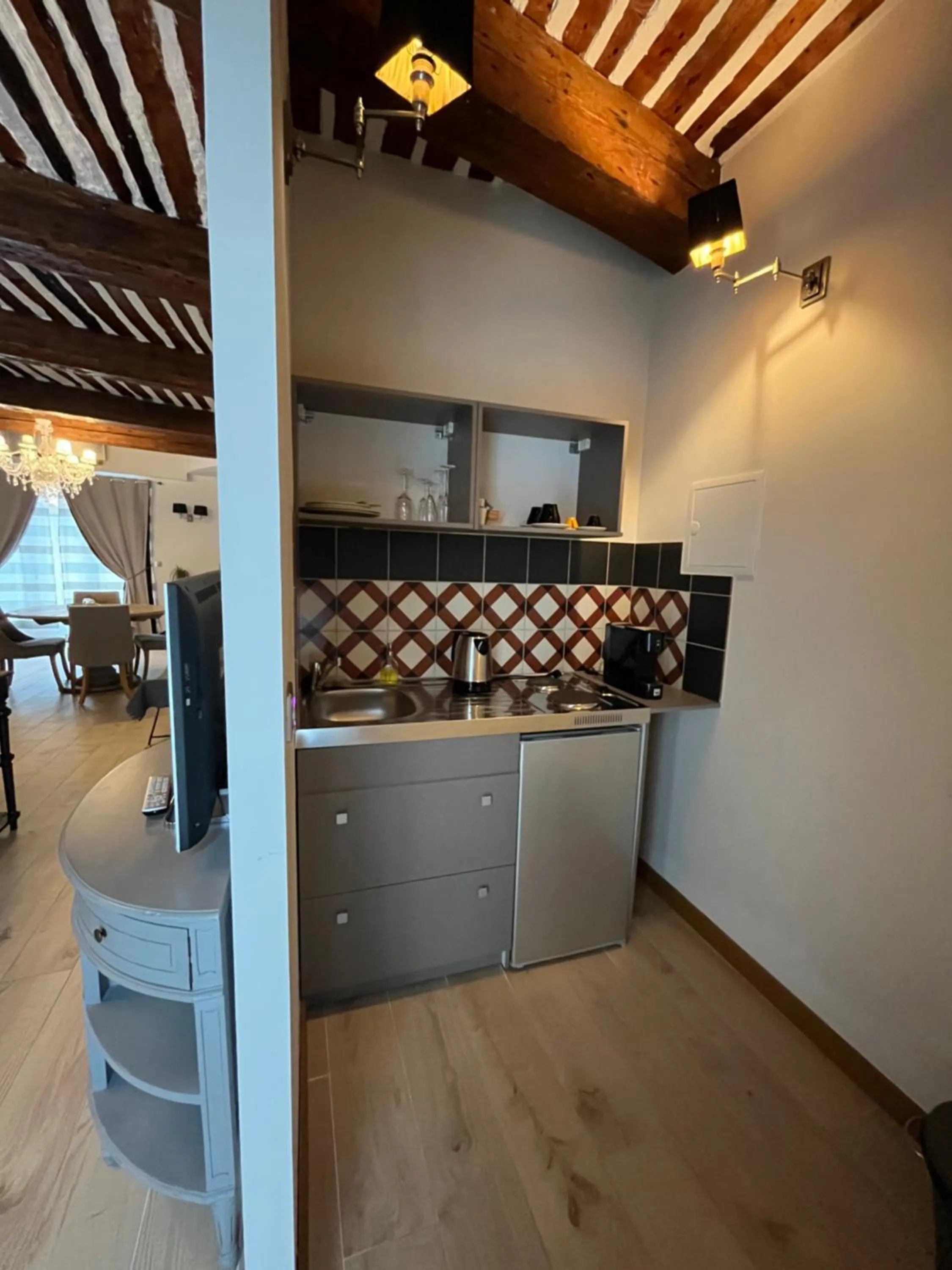 Kitchen or kitchenette in Maison d'Hôtes Les Variétés