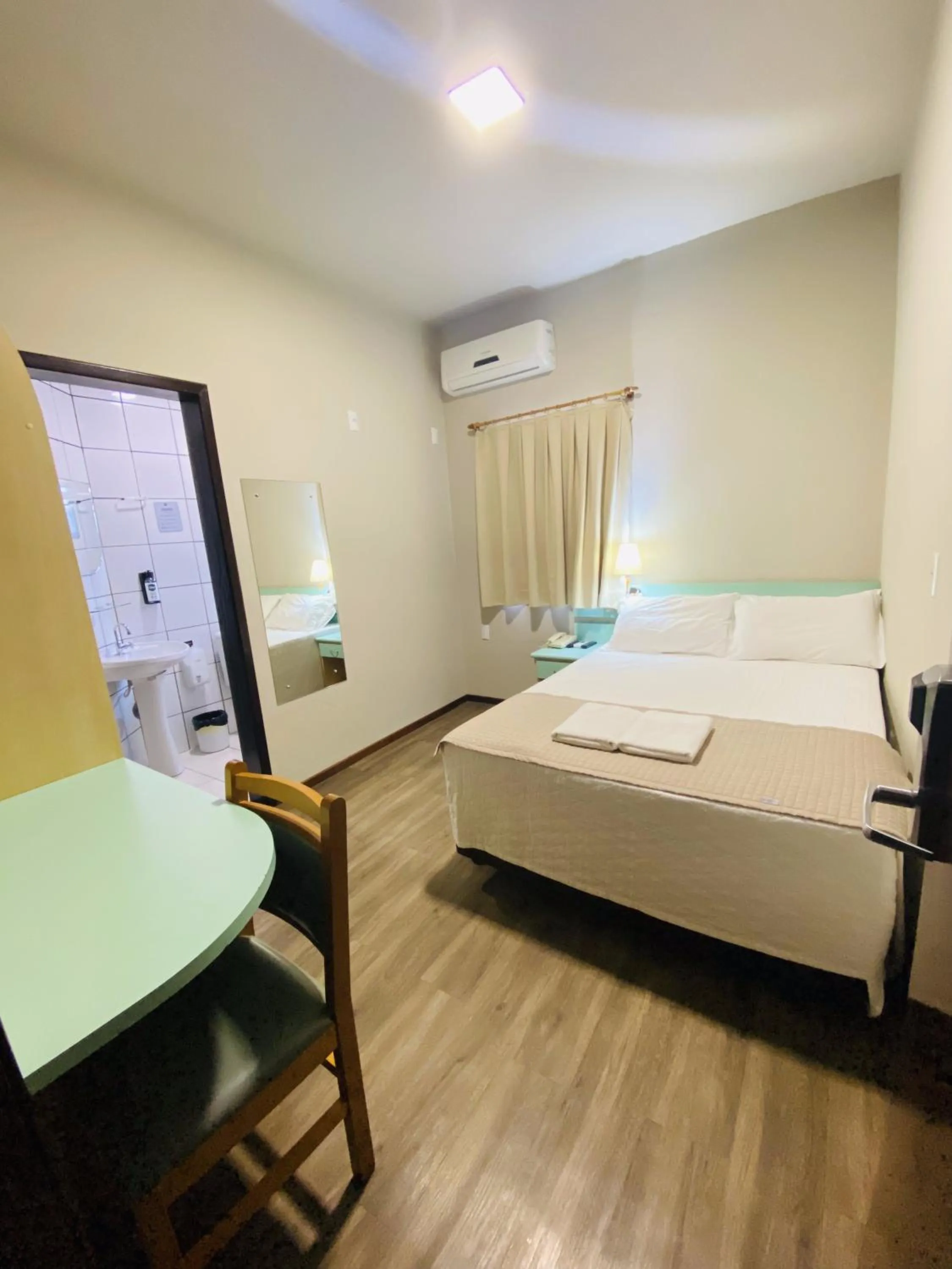 Bed in Real NOB Hotel